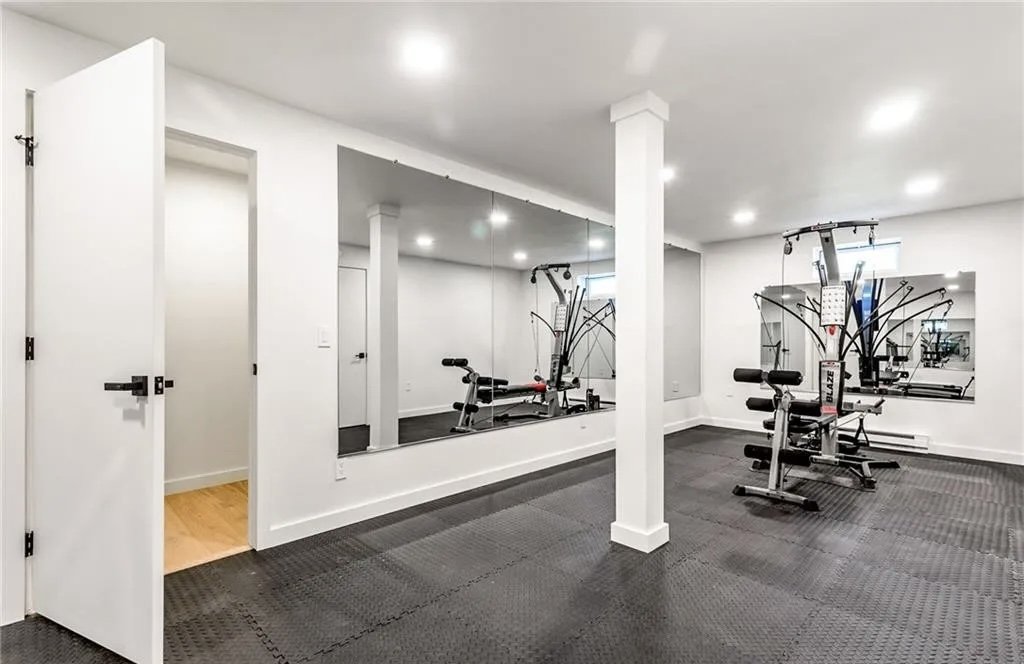 Finished gym in basement of modular home.jpg