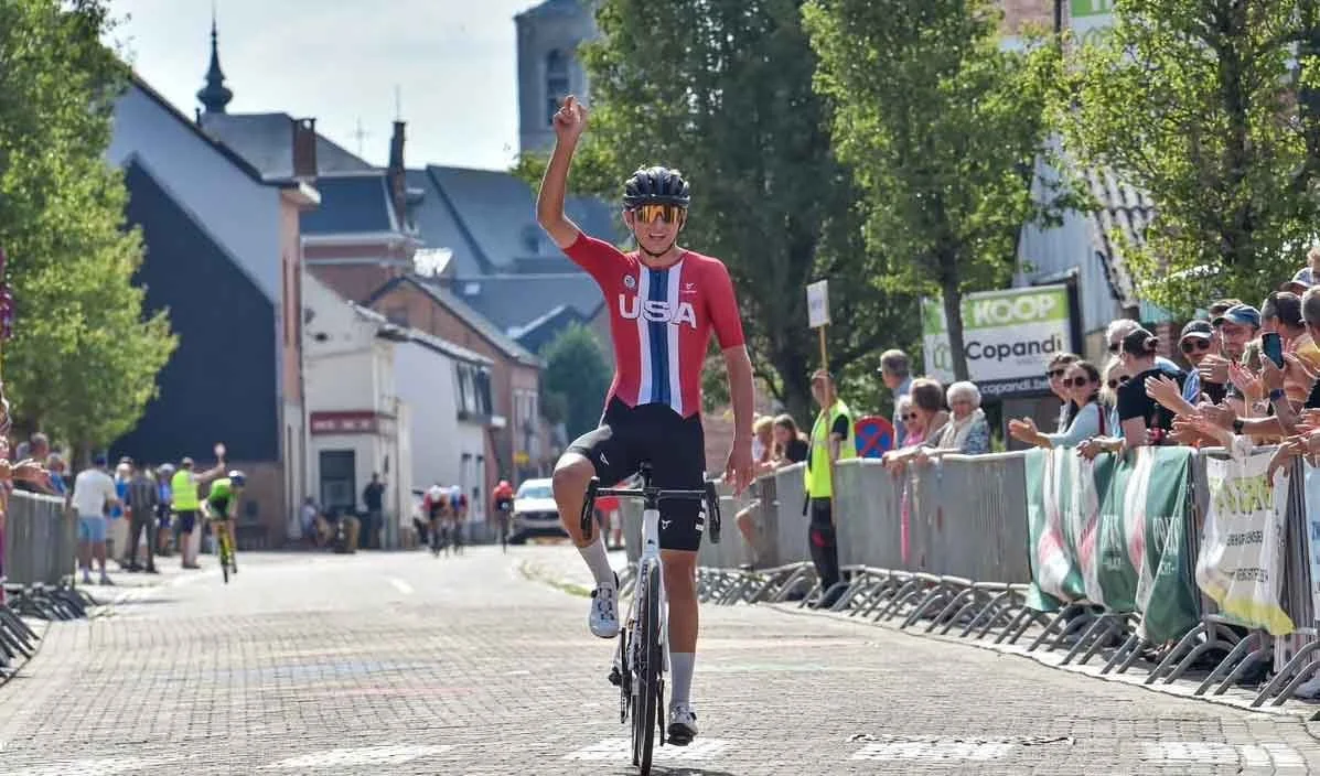 A coaching student in a red shirt on a bike as a cycling coach in durango co