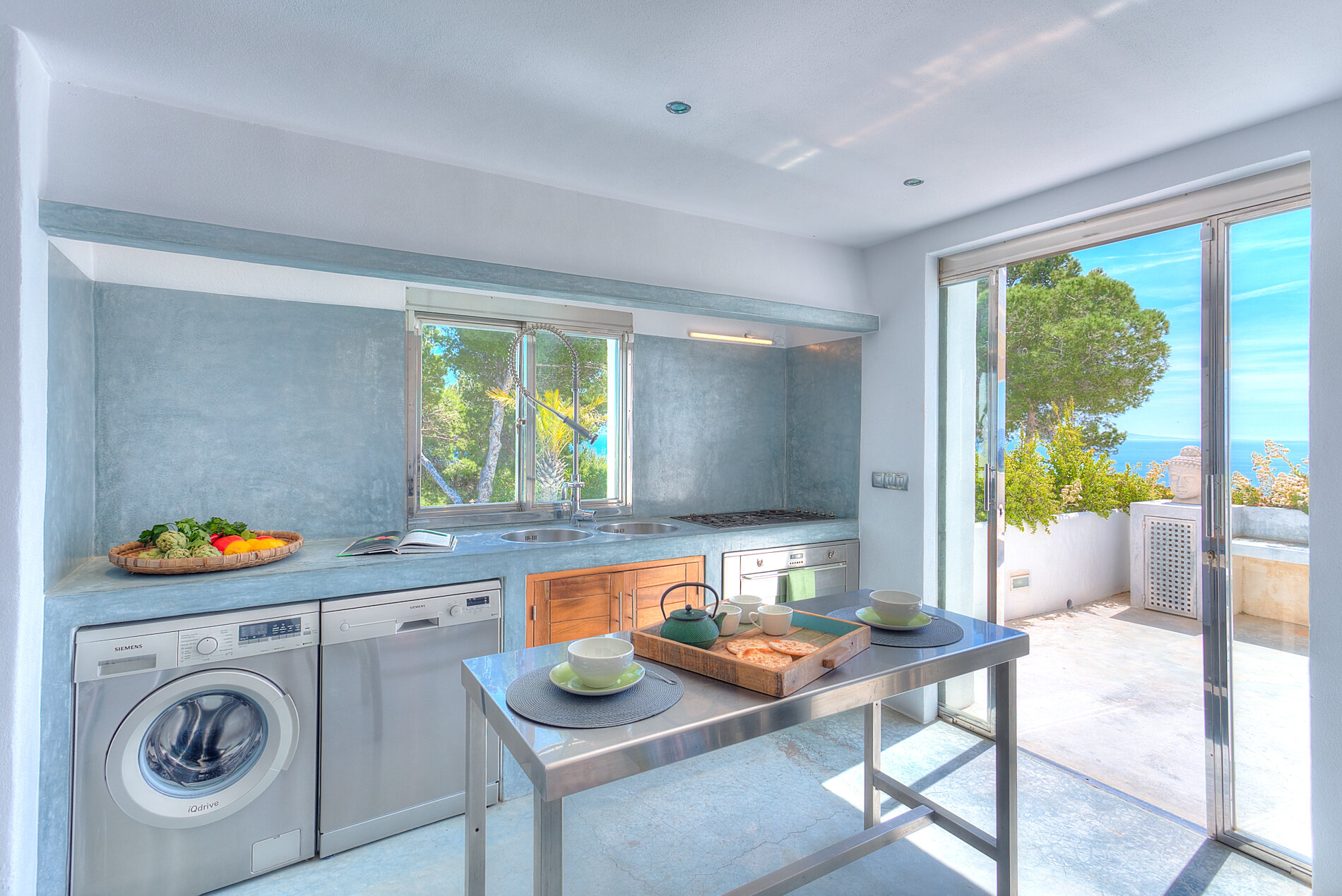 sun bathed kitchen with full equipment 