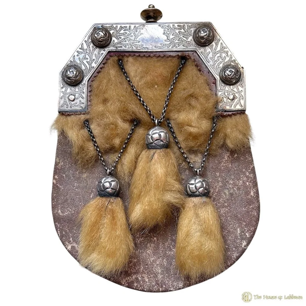 Pre restoration sporran with very badly worn fur