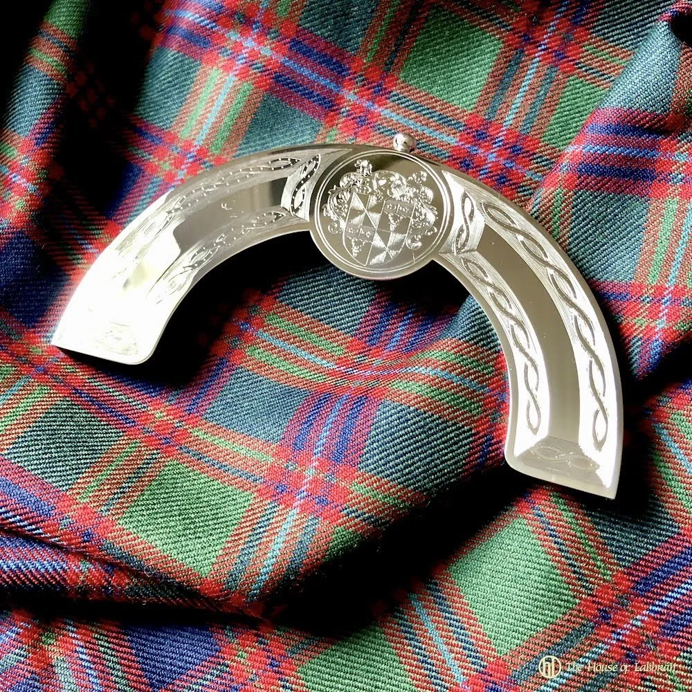 Engraved silver cantle