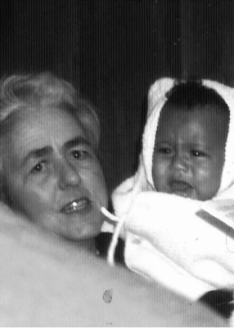 Maryline as a baby at her baptism in France, with her French grandma Margot