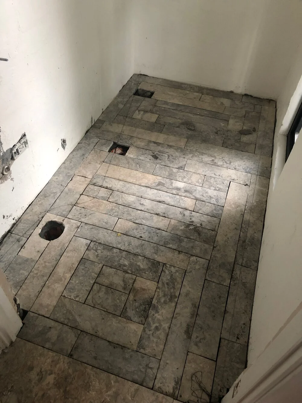 MARBLE BASEBOARDS TURNED BATHROOM FLOOR