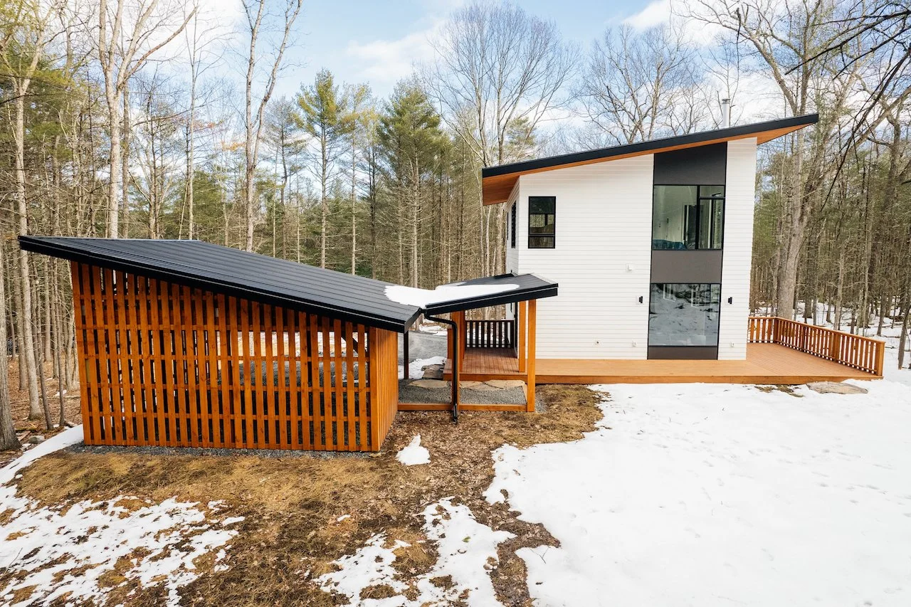 Modern home with guest apartment, located in the Catskill foothills, and 90 miles from NYC