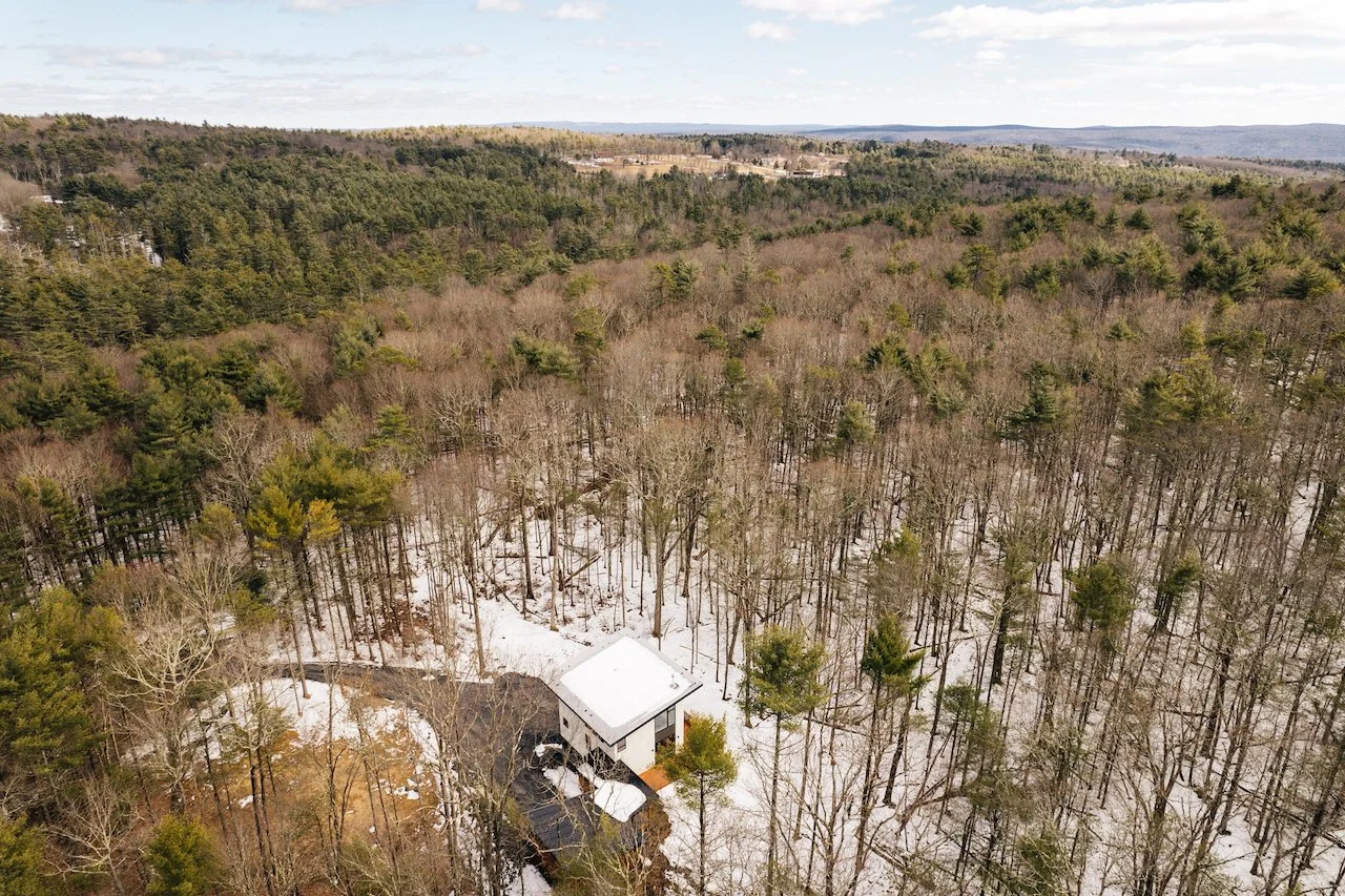 Modern home with guest apartment, located in the Catskill foothills, and 90 miles from NYC
