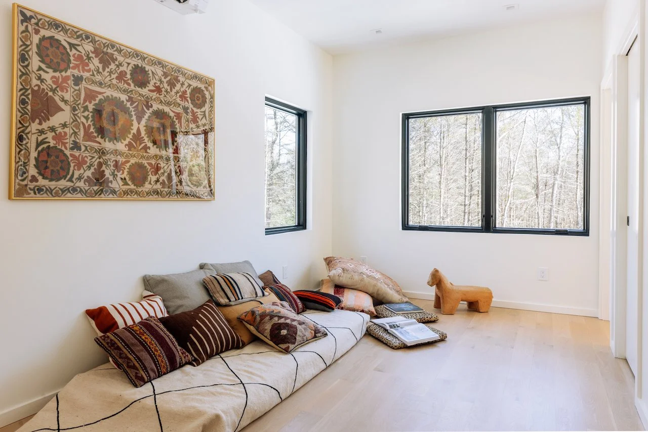 Modern home with guest apartment, located in the Catskill foothills, and 90 miles from NYC