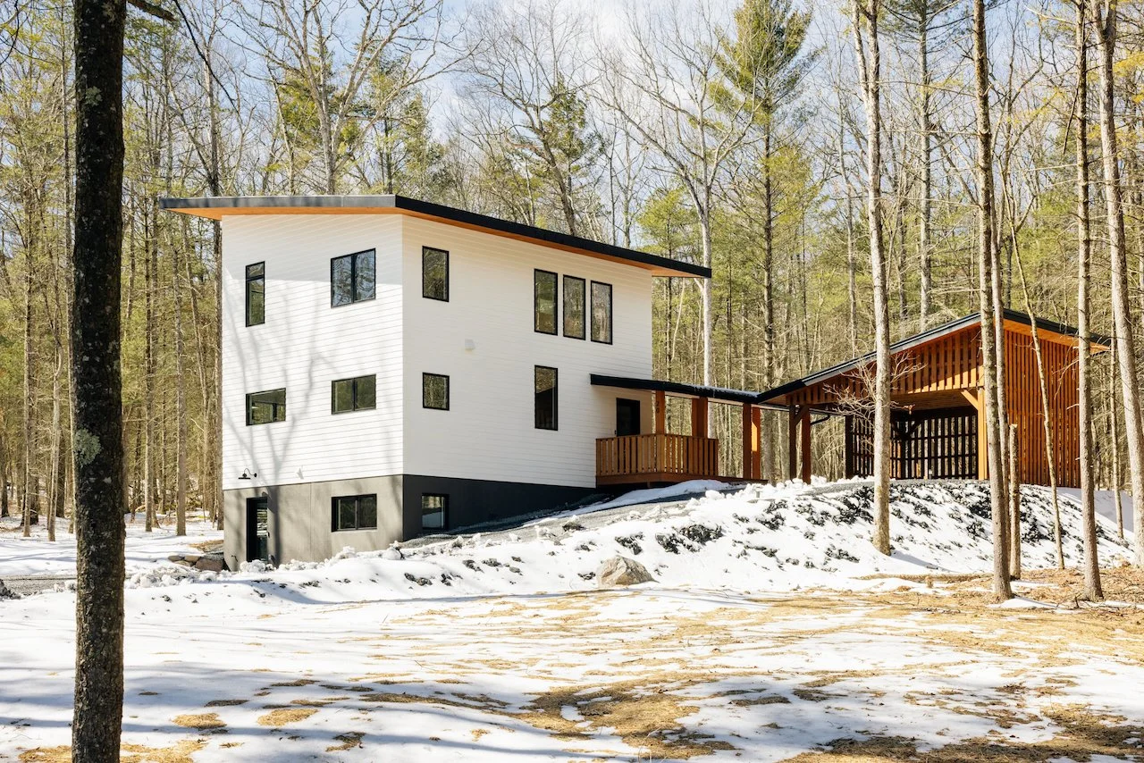 Modern home with guest apartment, located in the Catskill foothills, and 90 miles from NYC