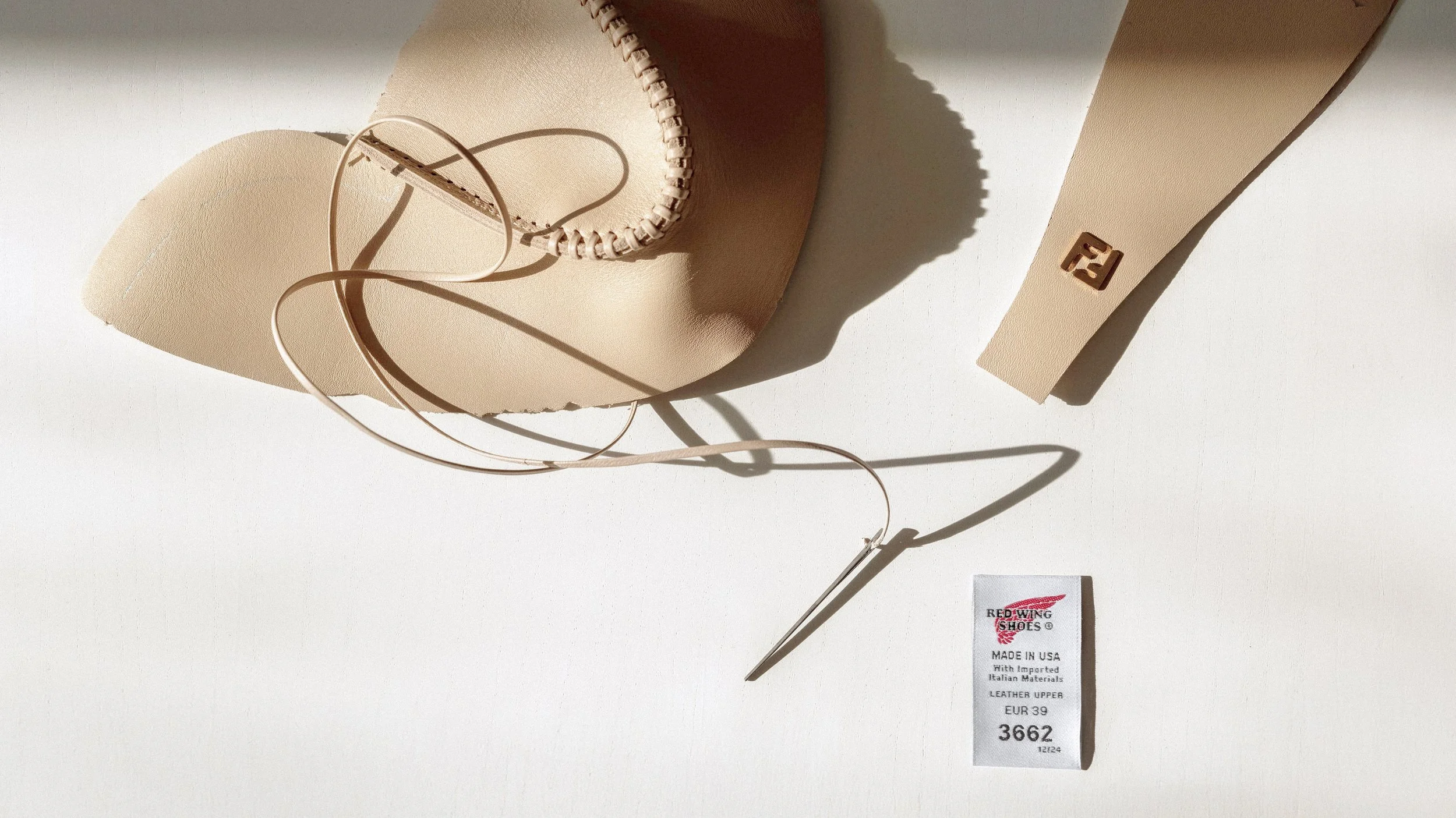 Image of boot upper being stitched with Fendi's signature stitch