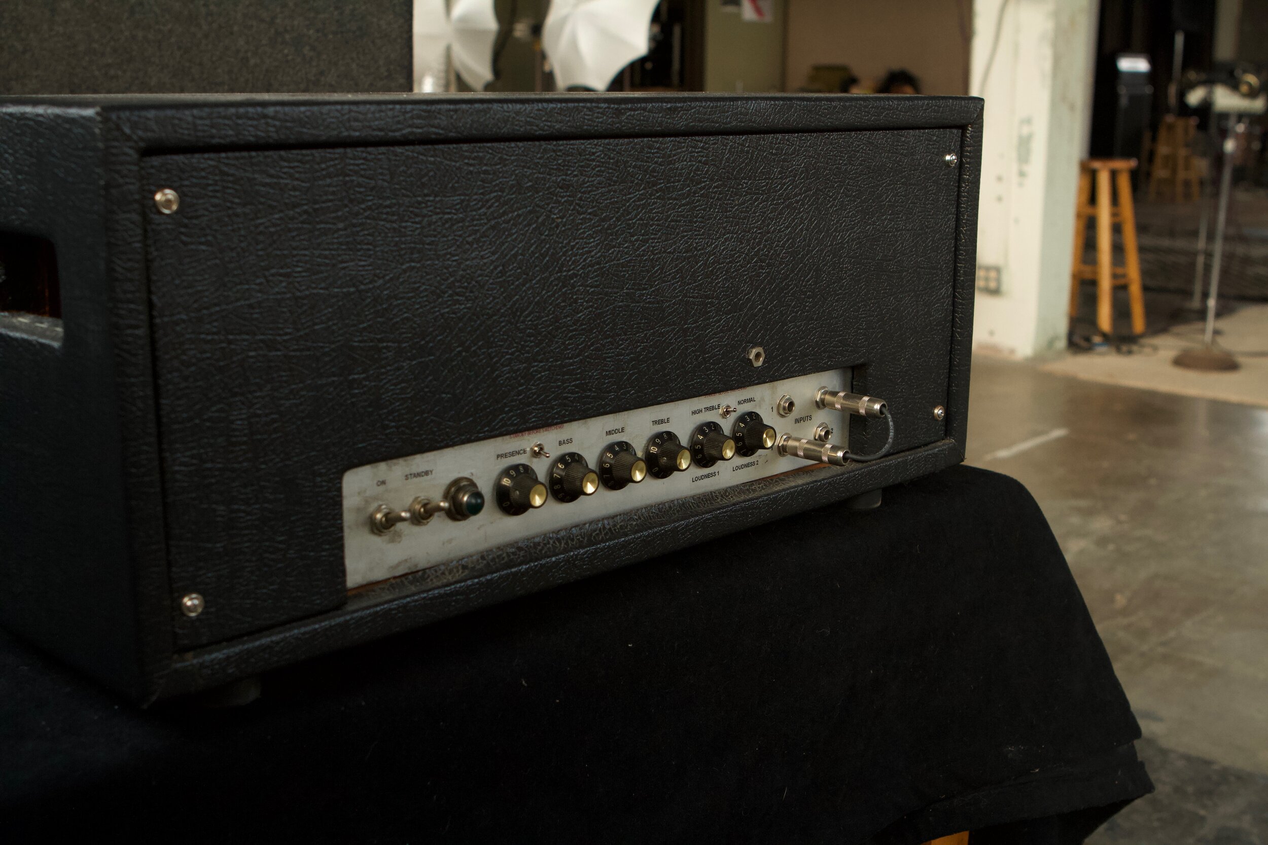 This amp build follows the 5F6A schematic, which was borrowed by Jim Marshall for the JTM-45 circuit. Blackface reverb is added with the control knob on the back panel. The quad of 6L6 power tubes drive a vintage ‘60s Twin Reverb output transformer,
