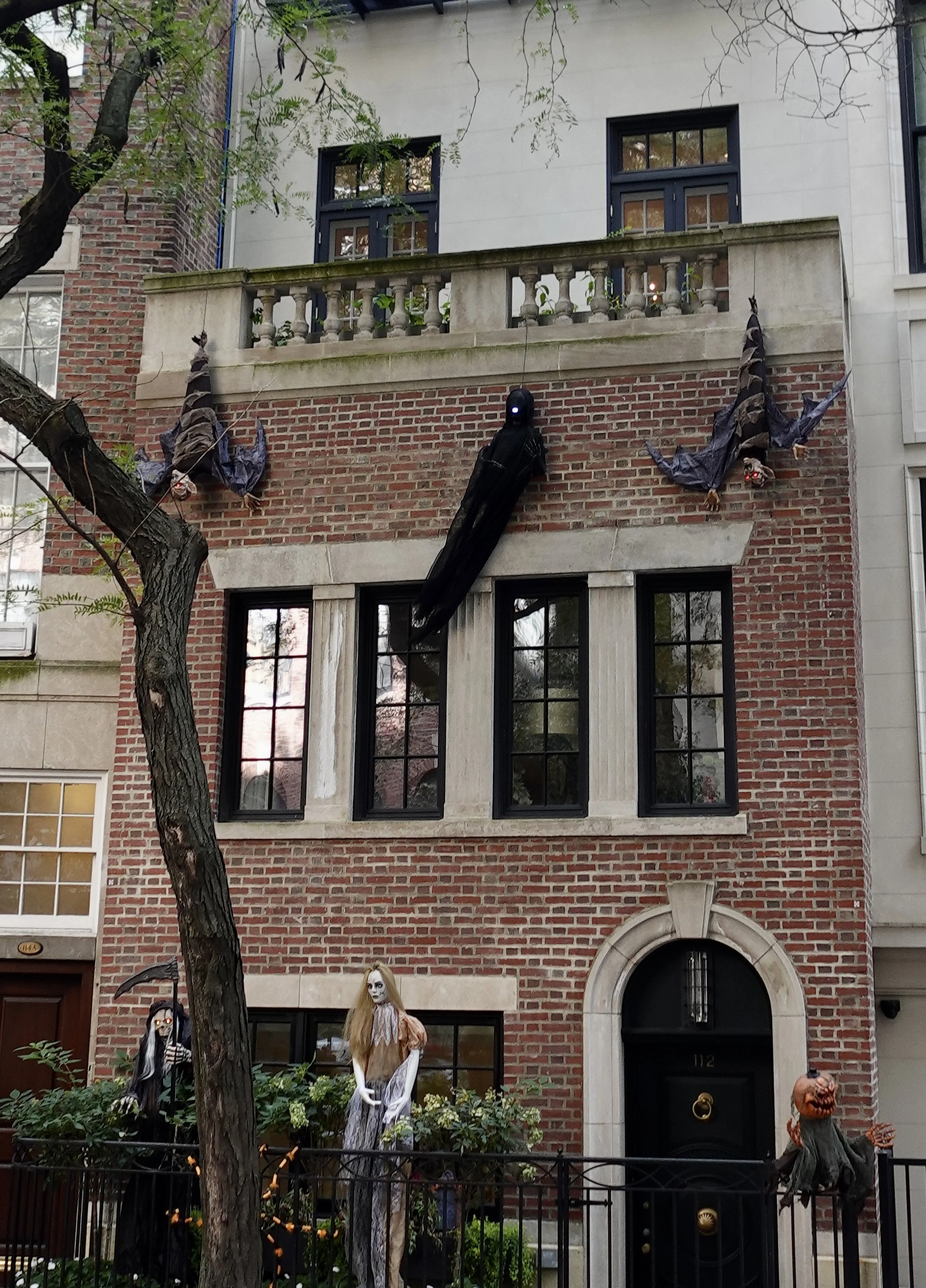  New York City brownstones decorated with Halloween decorations on the Upper East Side 
