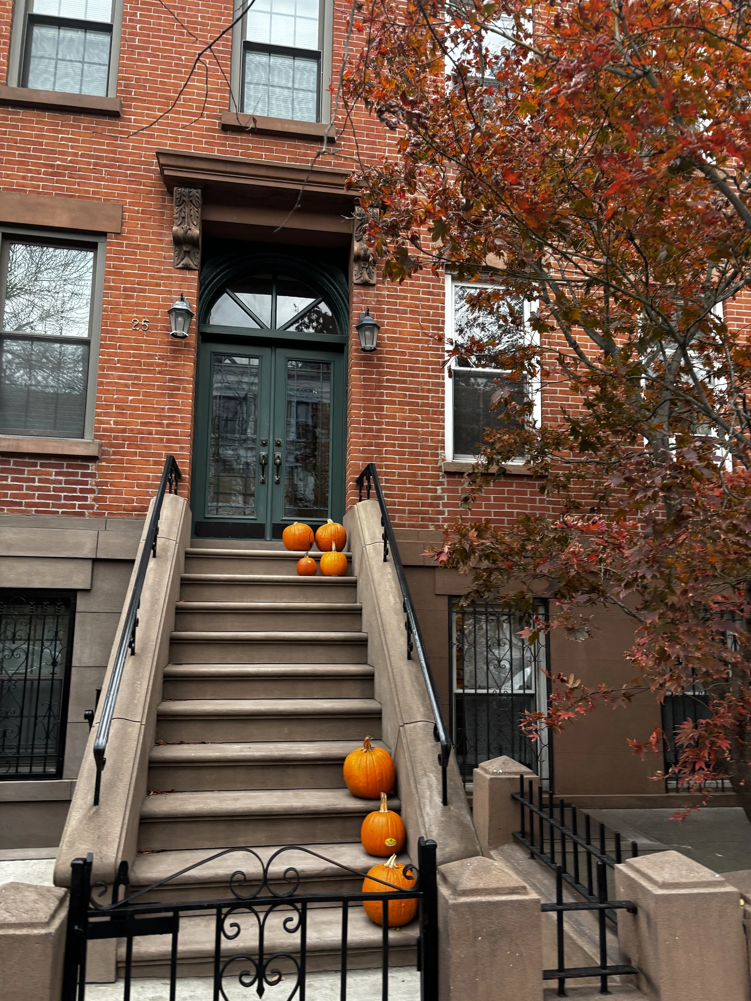  New York City brownstones decorated with Halloween decorations on the Upper East Side 