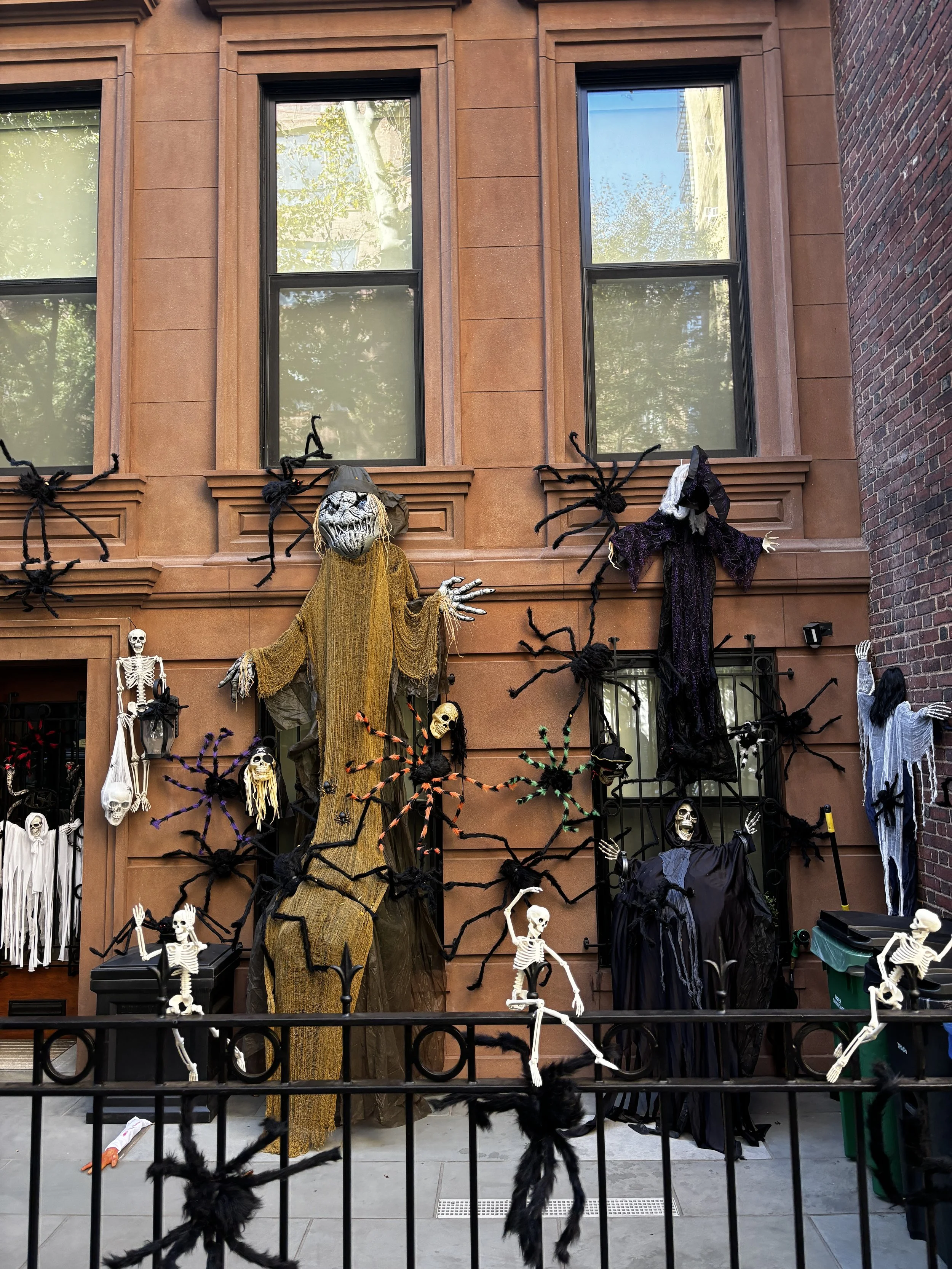  Brownstone townhouse in the Upper East Side decorated with pumpkins and Halloween decor 