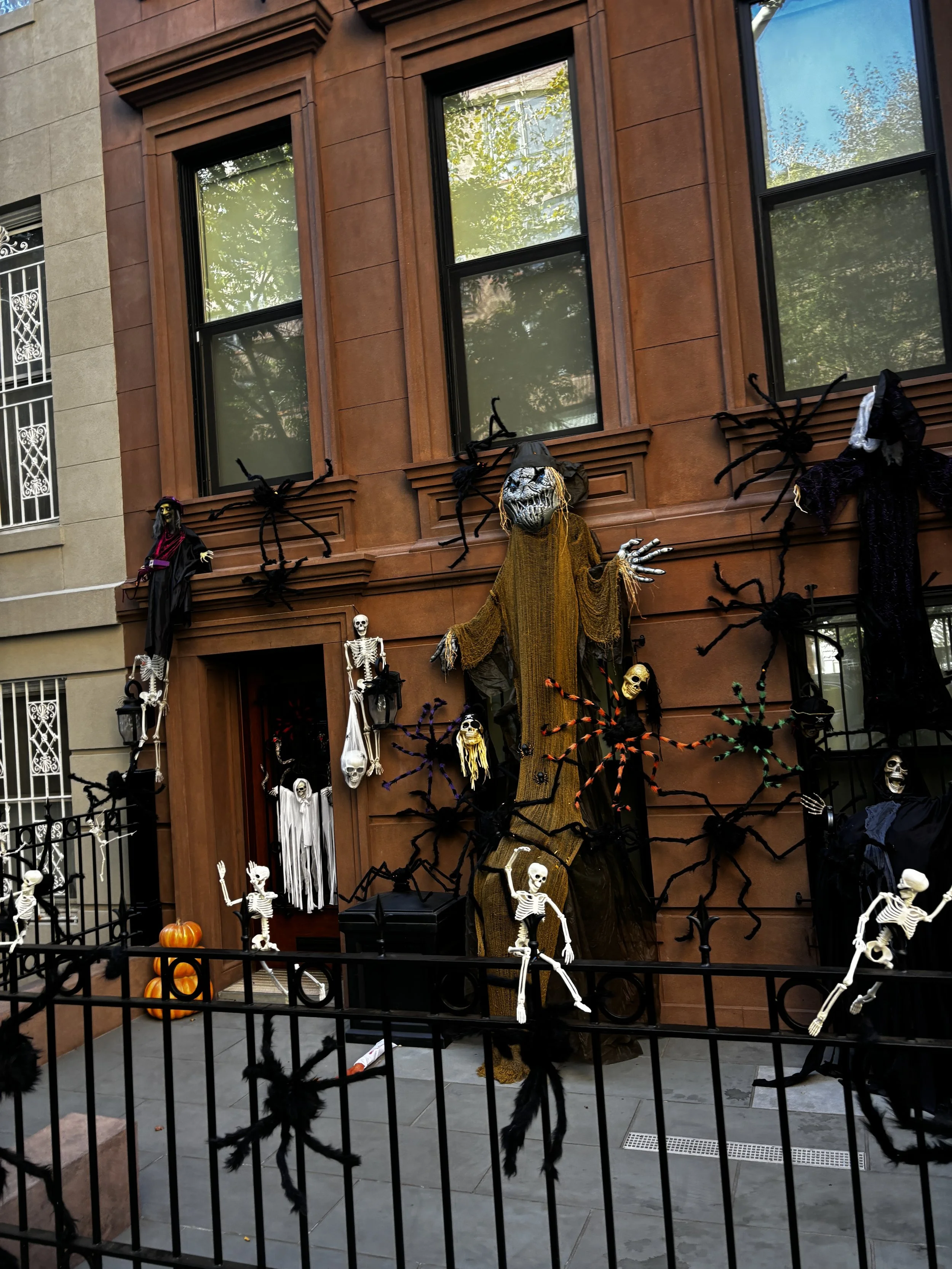  New York City brownstones decorated with Halloween decorations on the Upper East Side 
