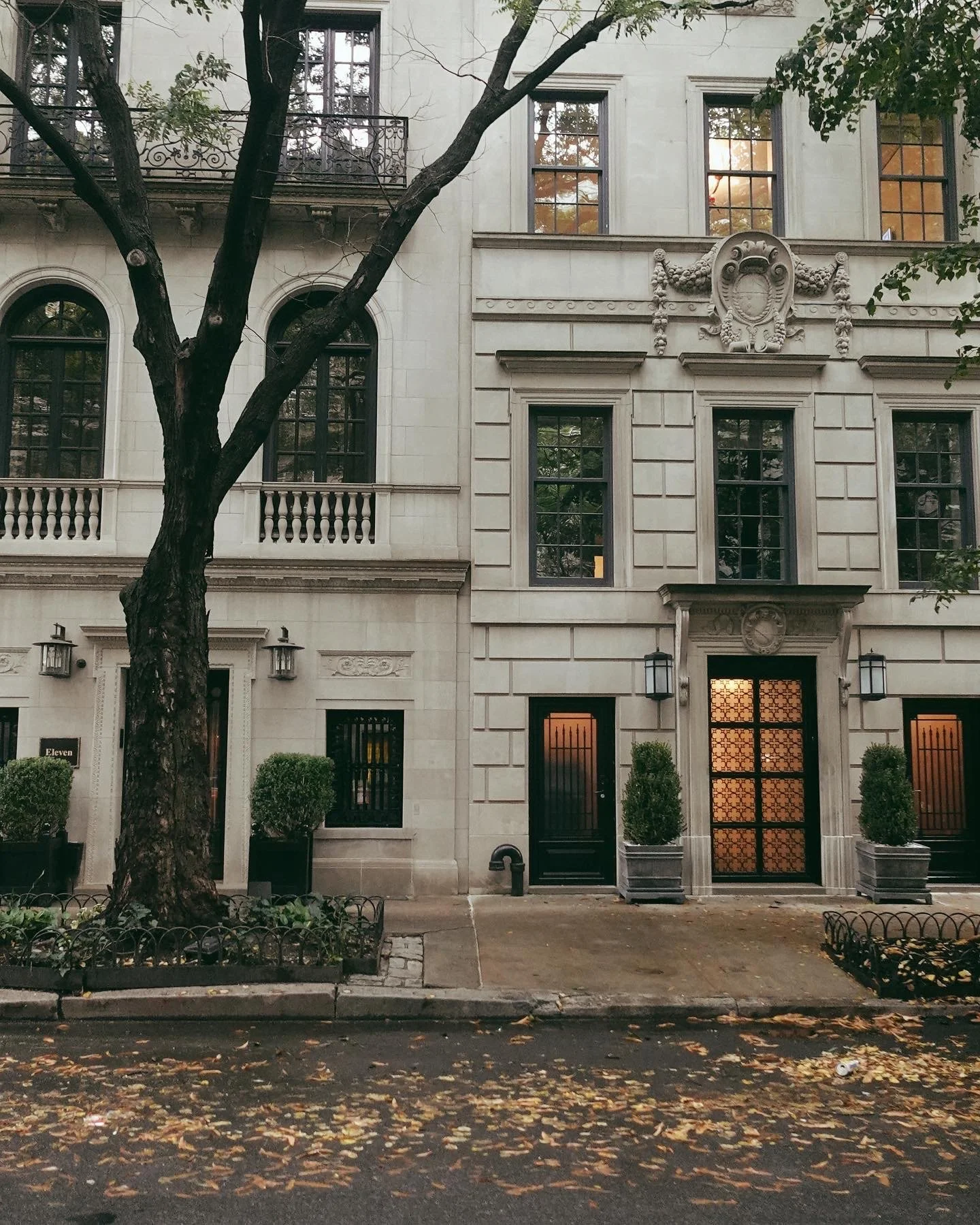 Fall in New York City with colorful trees, brownstones and cozy neighborhood streets