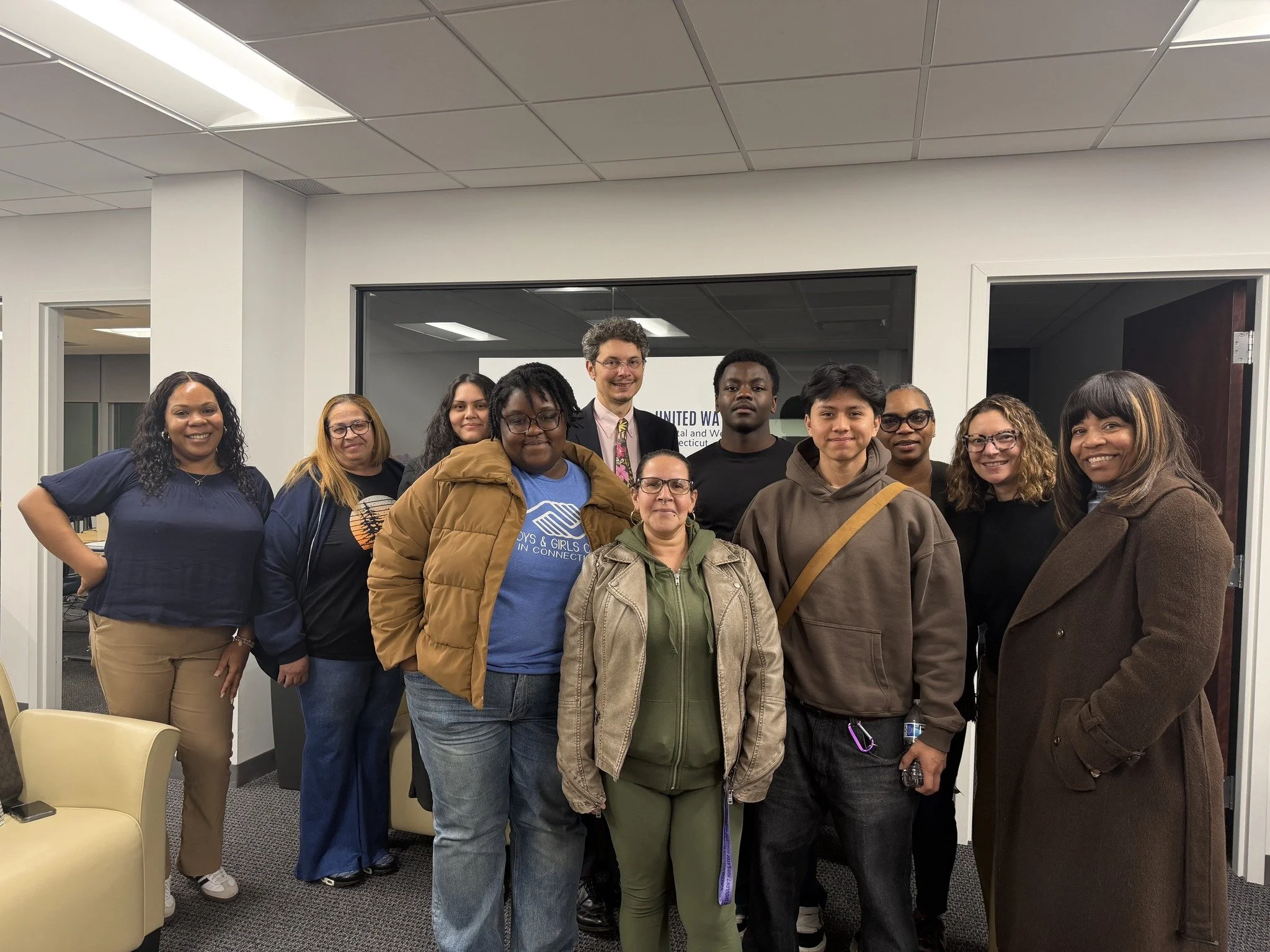 Bridgeport Prospers Care Health Leaders standing with Mark Abraham, CEO of DataHaven