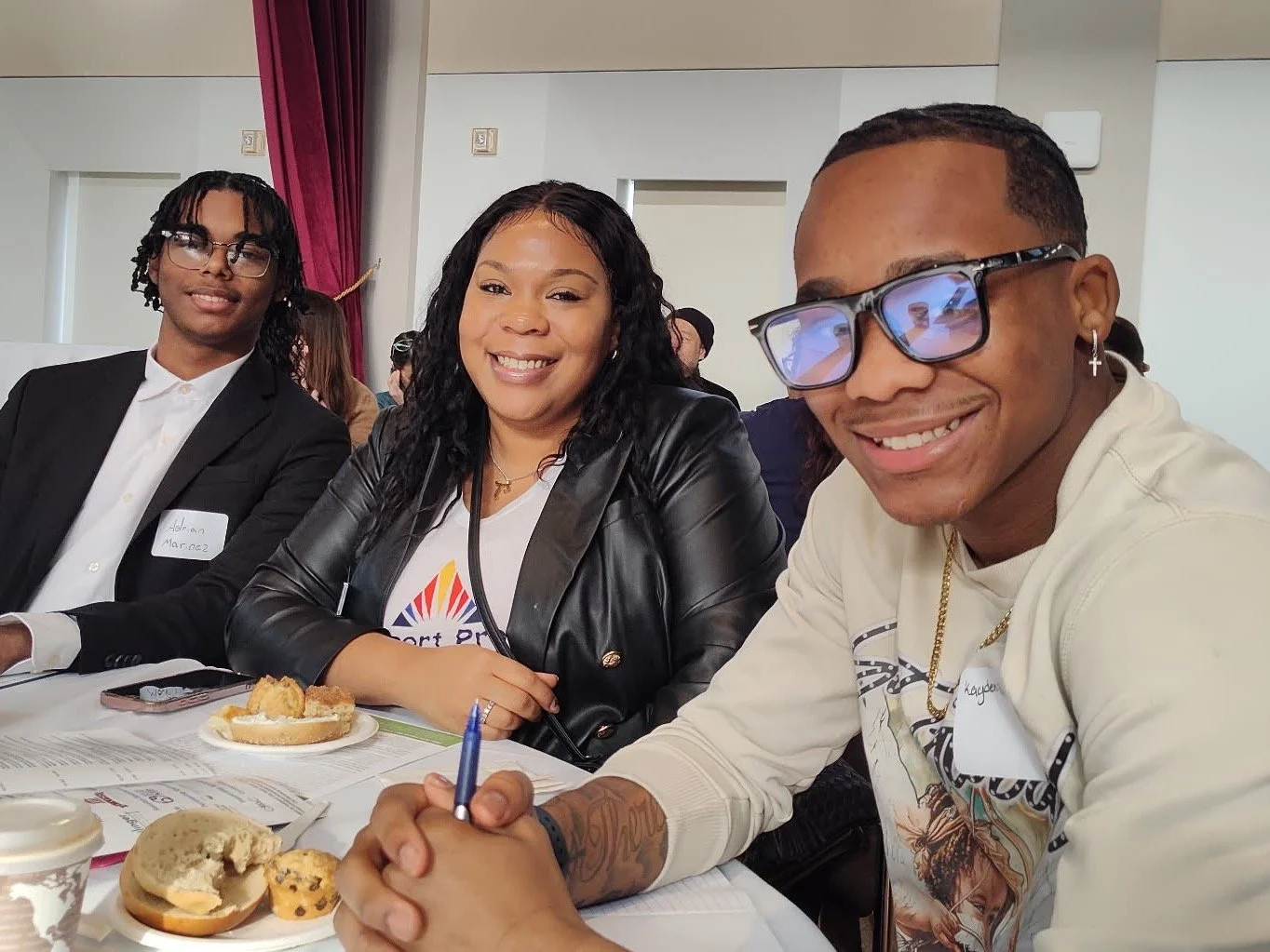 Bridgeport Prospers - Talyn Cook, Senior Manager of Civic & Community Engagement, with two of our Youth 
Advocates. 
