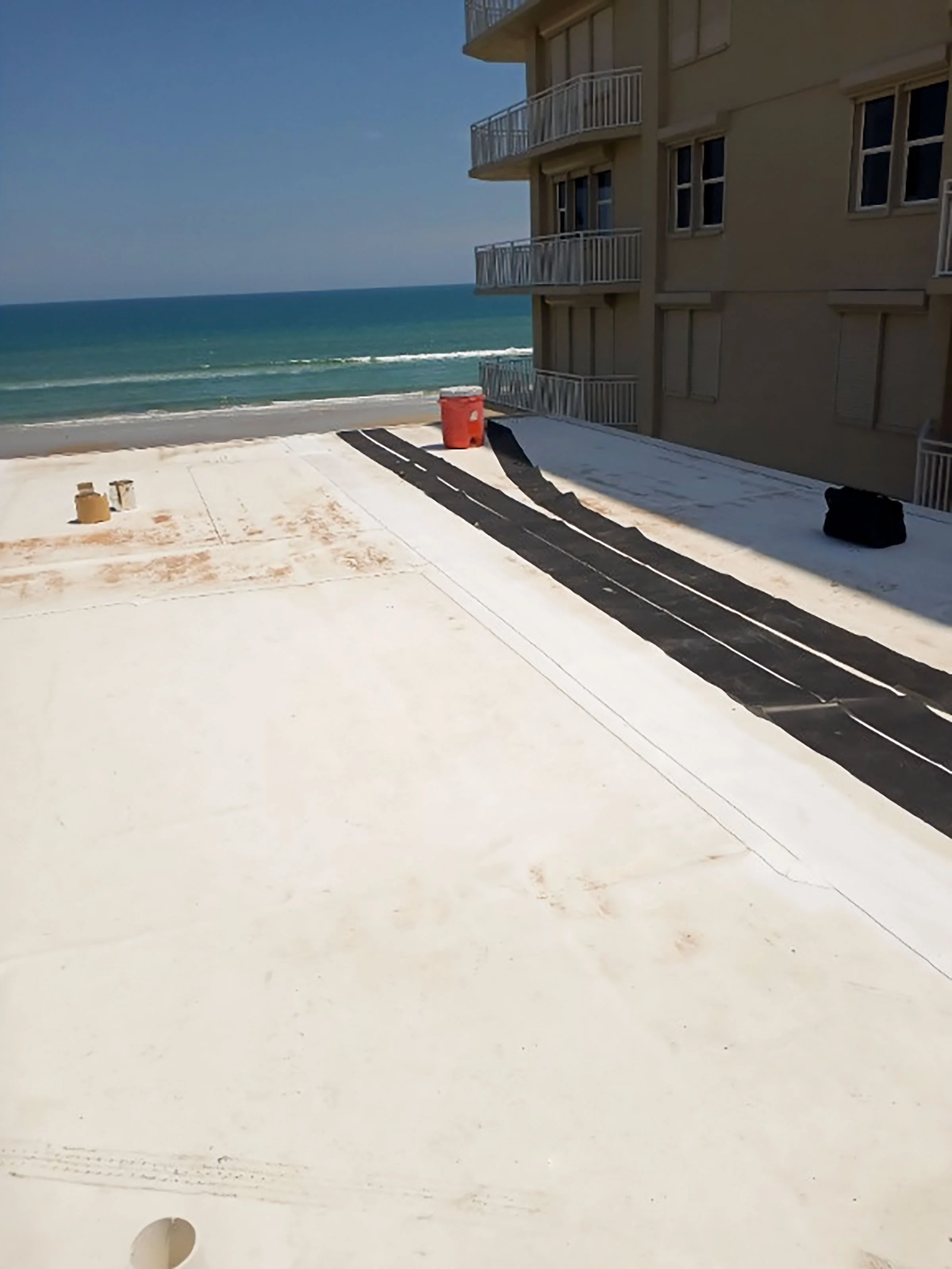 Reliable &amp; Cost-Effective Roof Repairs Needed for Beachside Condo Building