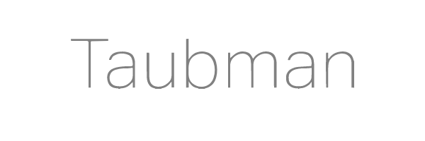 Taubman – Greyscale.png