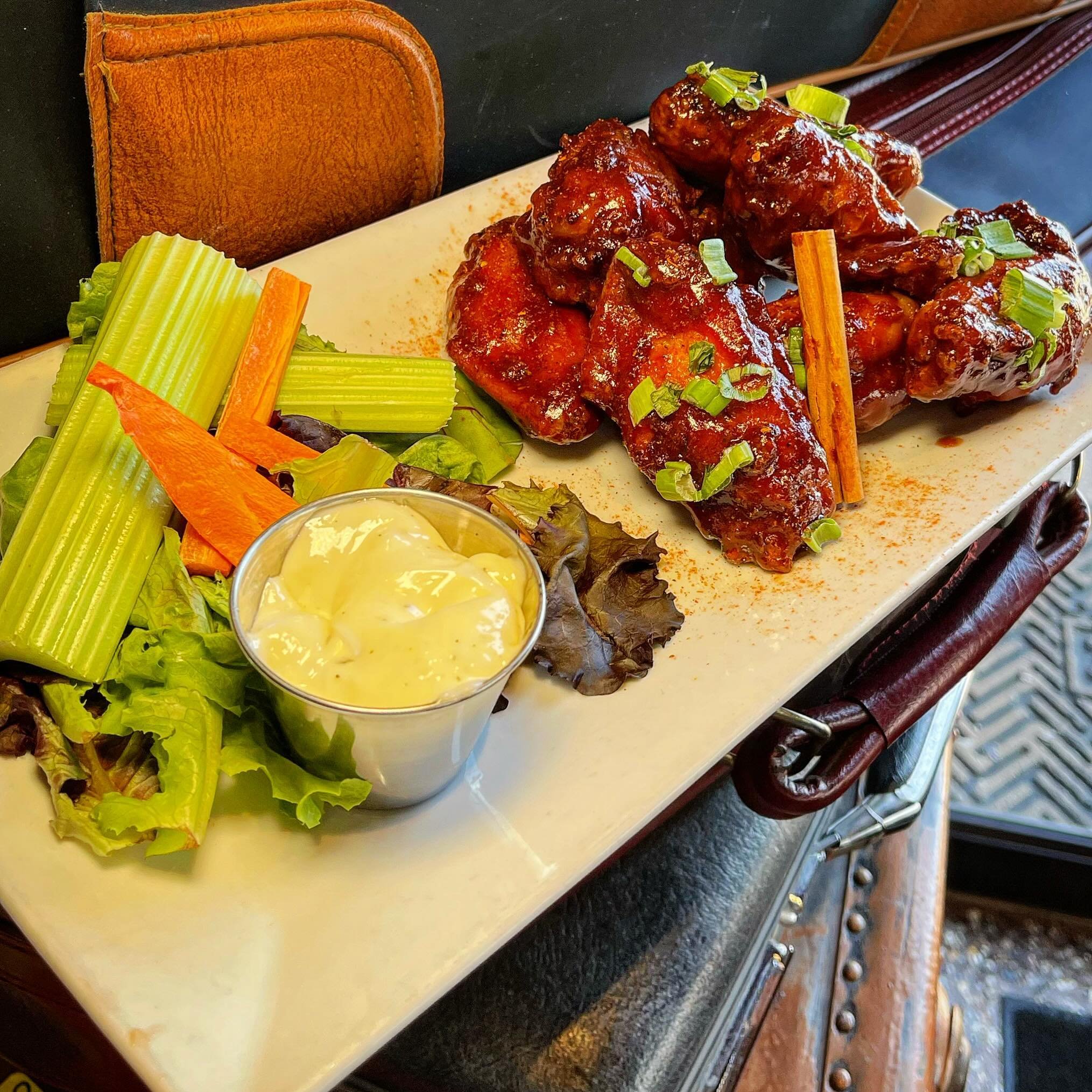 Hangar Hickory Cajun BBQ Wings- No Monkeying around with these jumbo wings! Baked in our secret monkey rub, then fried crispy. Tossed with a house-made hickory smoked BBQ sauce. Served with a side of house-made ranch.