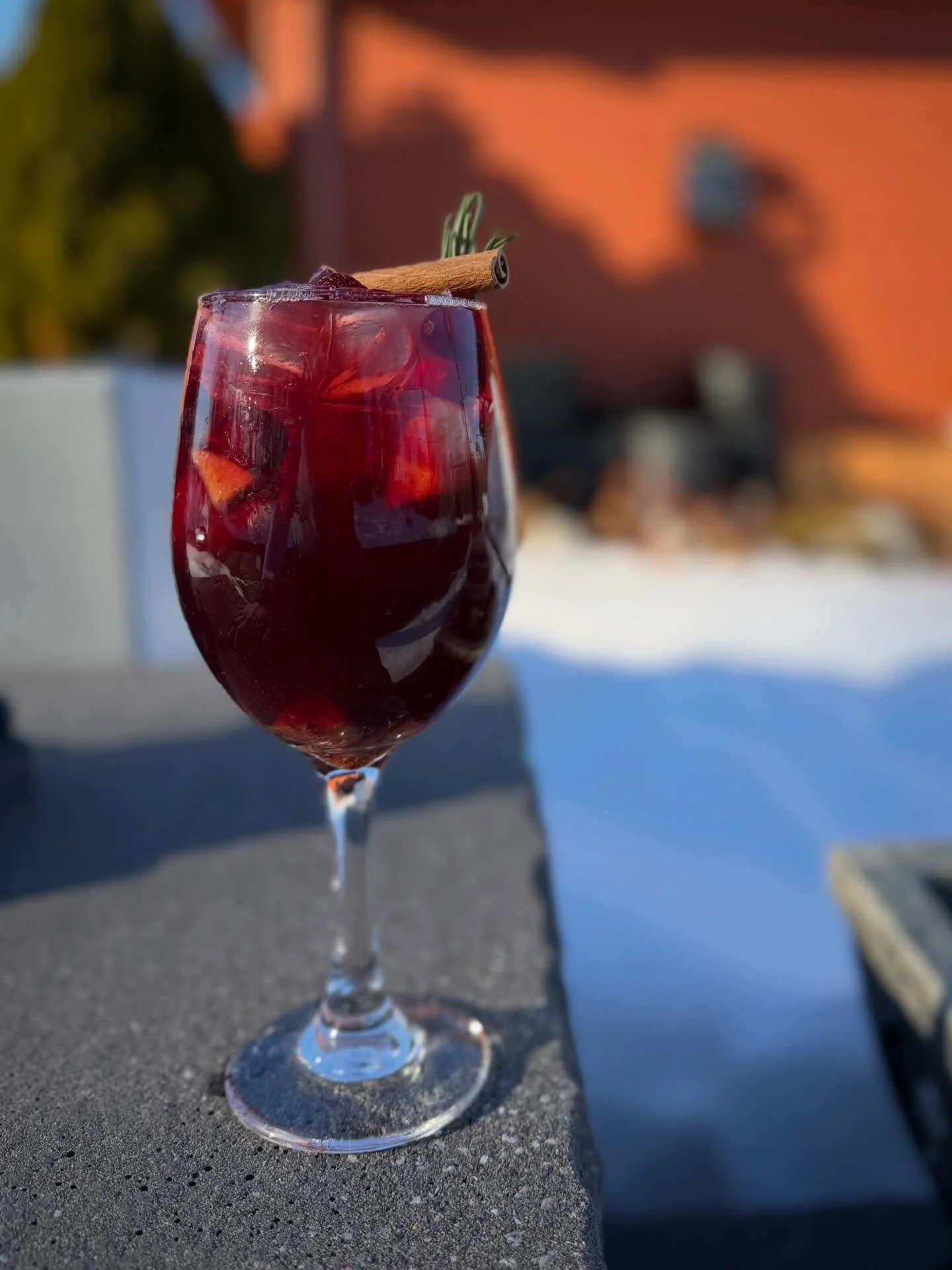 Harvest Sangria blends crisp apple liqueur with smooth Licor 43, fresh apple slices, tart cranberries, juicy chopped figs, and rich apple cider, all infused with warm cinnamon sticks for that perfect seasonal spice