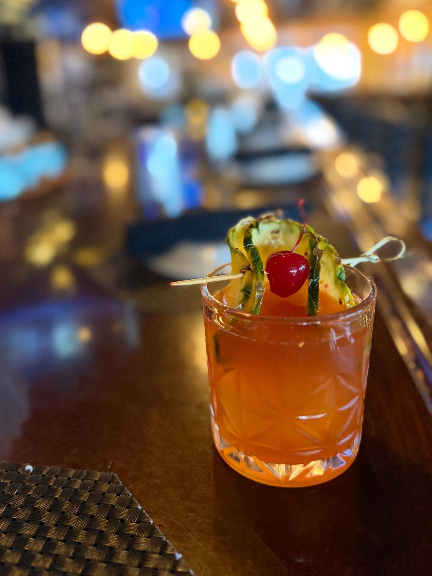 Tropical twist meets cozy spice. A Pineapple Old Fashioned with smooth bourbon, pineapple, rich brown sugar, and a warm chai simple, finished with Angostura &amp; orange bitters. Sweet, spiced, and just the right amount of bold