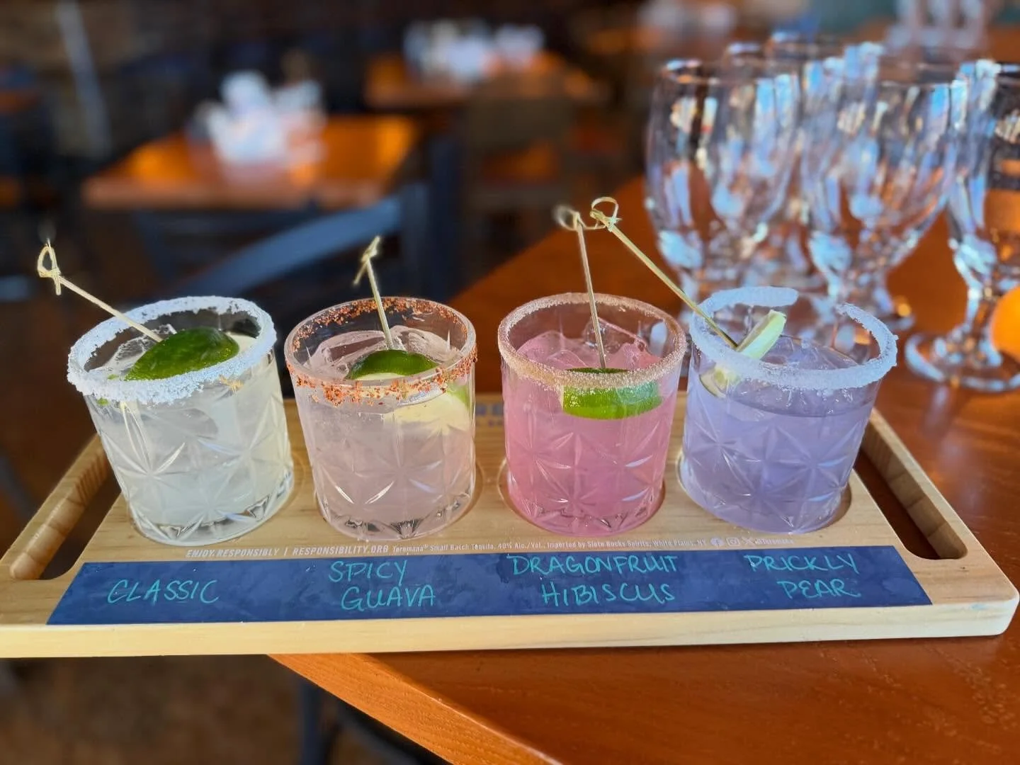 margarita summer flight- classic marg with fresh lime + tequila, dragonfruit hibiscus for a floral fruity twist, spicy guava with just the right heat, and prickly pear for that soft desert sweetness chilled, colorful, and made for golden hour sipping