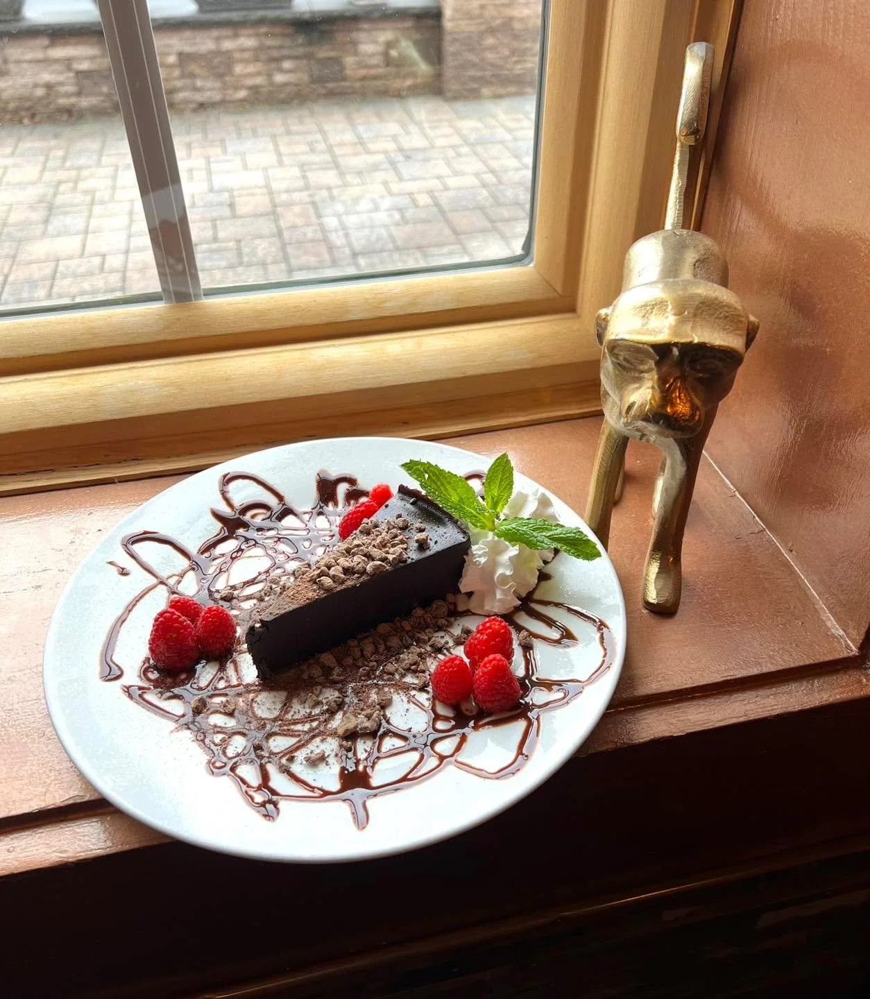 Rich, indulgent, and completely gluten-free 🍫✨

Meet the Crosswind Chocolate Cake - a decadent flourless chocolate cake topped with fresh raspberries, a silky chocolate drizzle, and whipped cream, finished with a delicate chocolate dusting.

#livemu