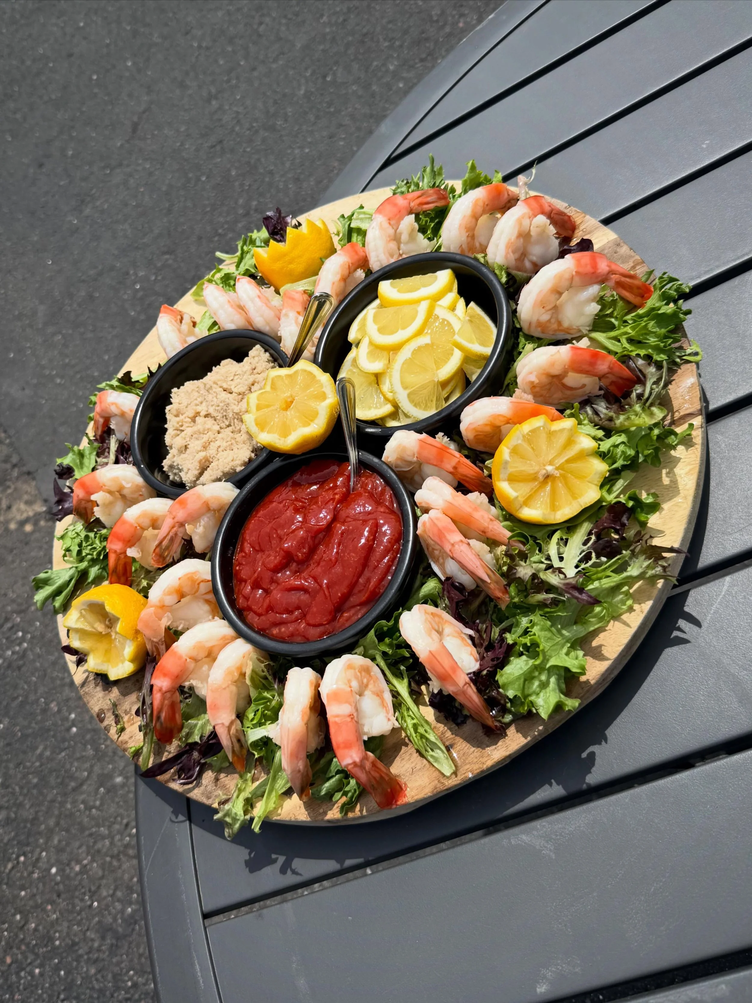 Elevate your next private patio party with our Jumbo Shrimp Cocktail(Catering Menu Only)🦐

Chilled jumbo shrimp, signature cocktail sauce, fresh citrus, and a garden oasis setting surrounded by lush palms, vibrant flowers, and tropical greenery. The