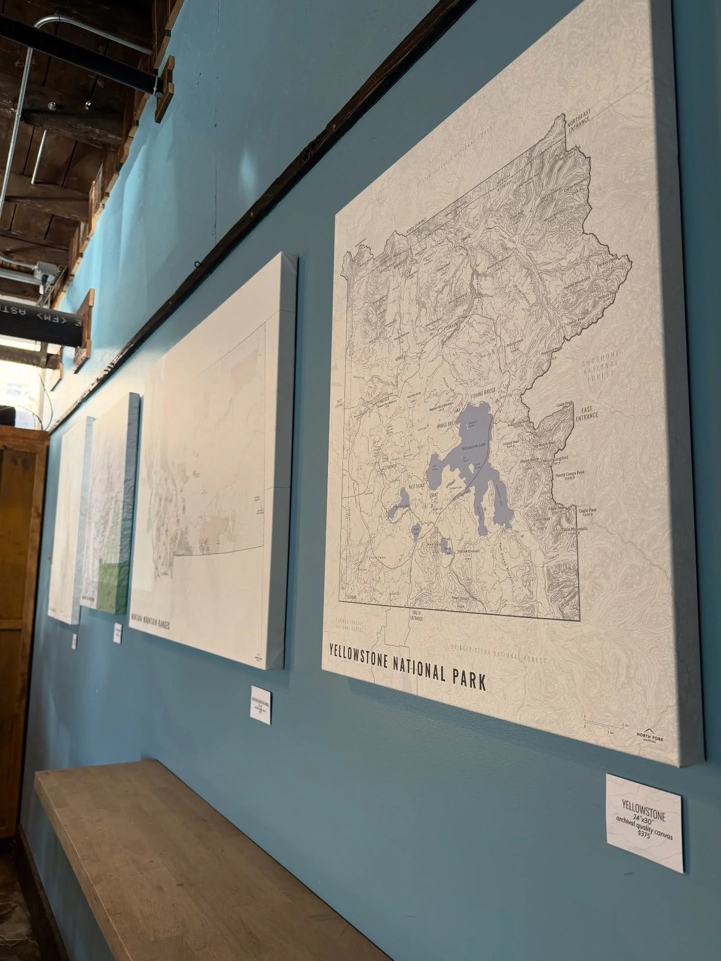 Thrilled to be collaborating with @wildryewhiskey ! North Fork Mapping maps on archival canvas wraps now hanging in the Tasting Room