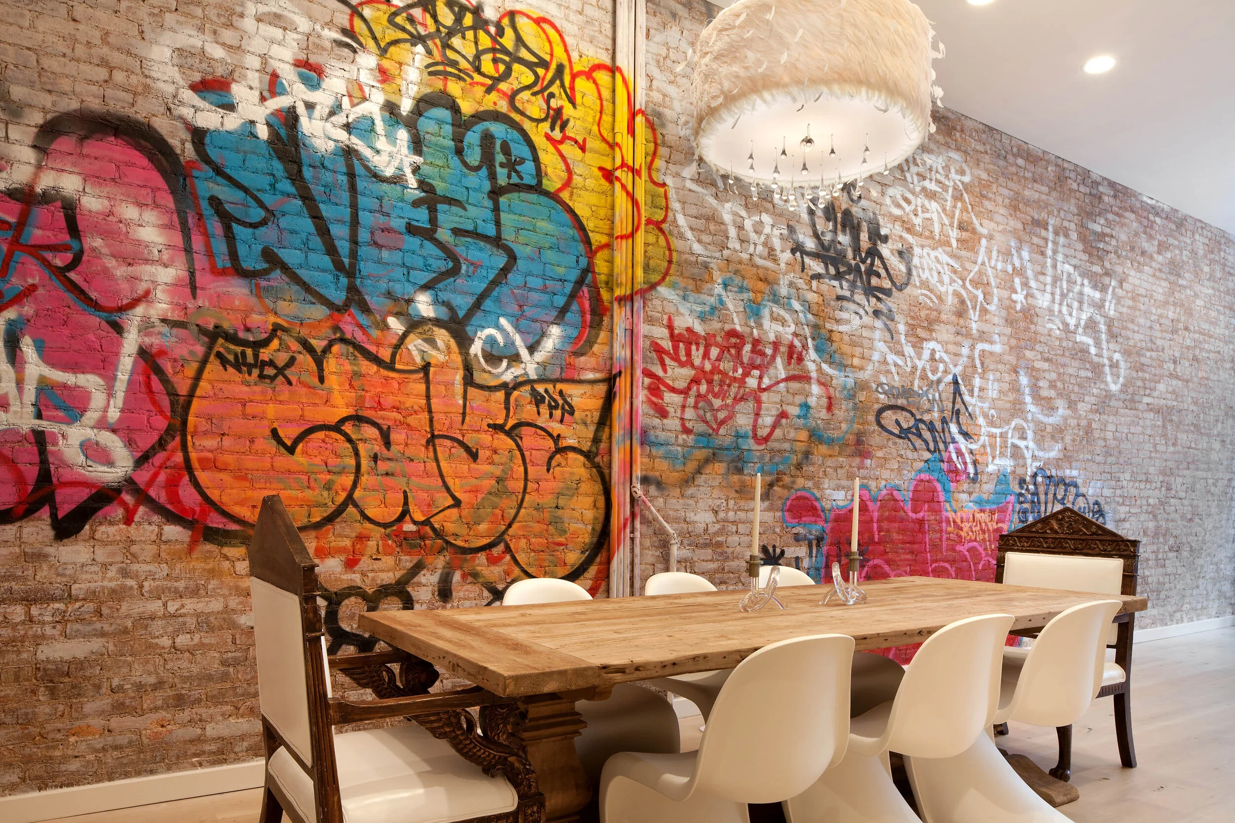 graffiti wall feather pendant NYC duplex.jpg