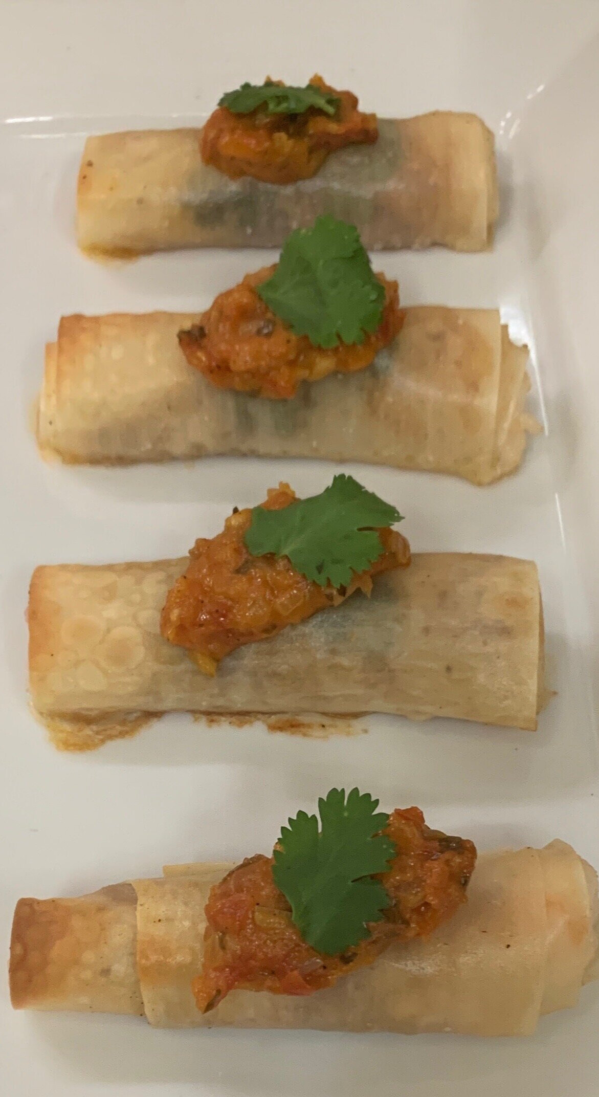 Phyllo wrapped shrimp rolls with tomato chuttney