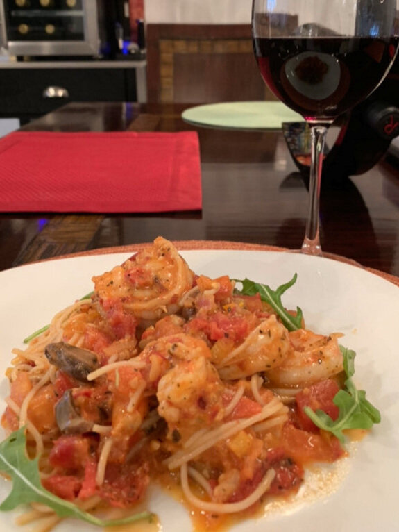 Cajun shrimp with pasta and arugala