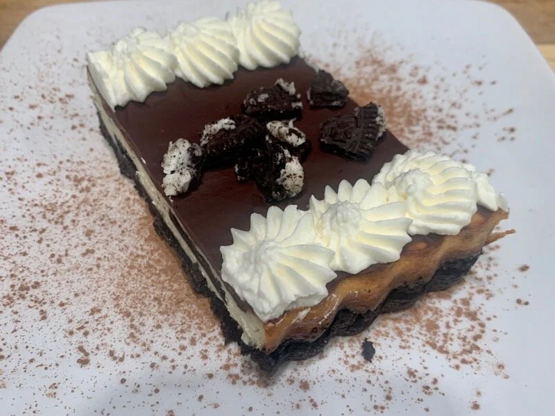 OREO COOKIE CHEESECAKE WITH FRESH WHIPPED CREAM
