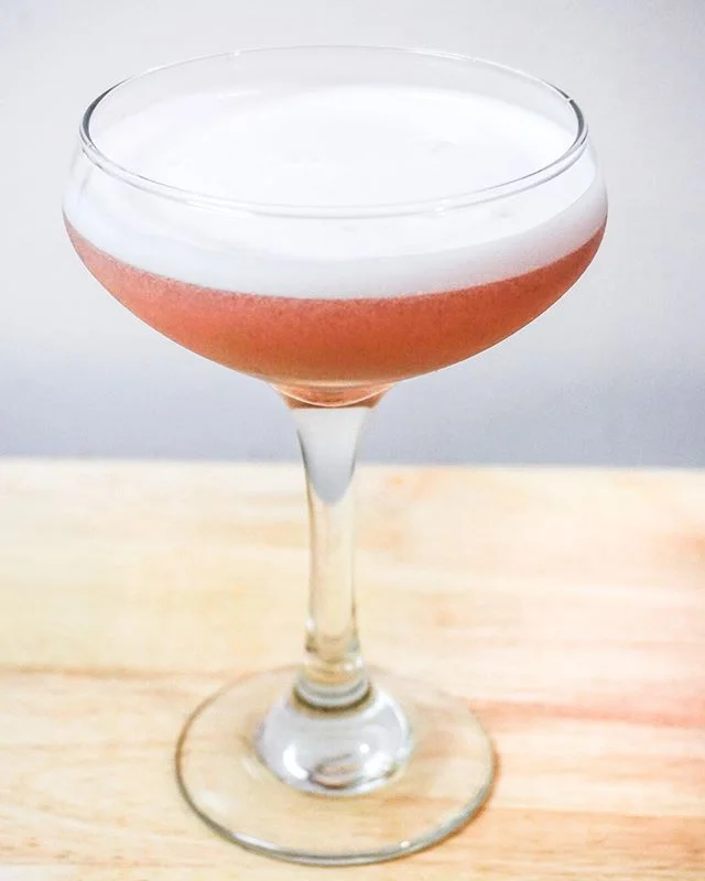 Egg white cocktails are criminally underrated. In addition to creating a deliciously fluffy layer of foam, egg white cocktails technically pack a decent amount of protein in every glass. I do not, of course, endorse ravenously drinking Pink Lady's to