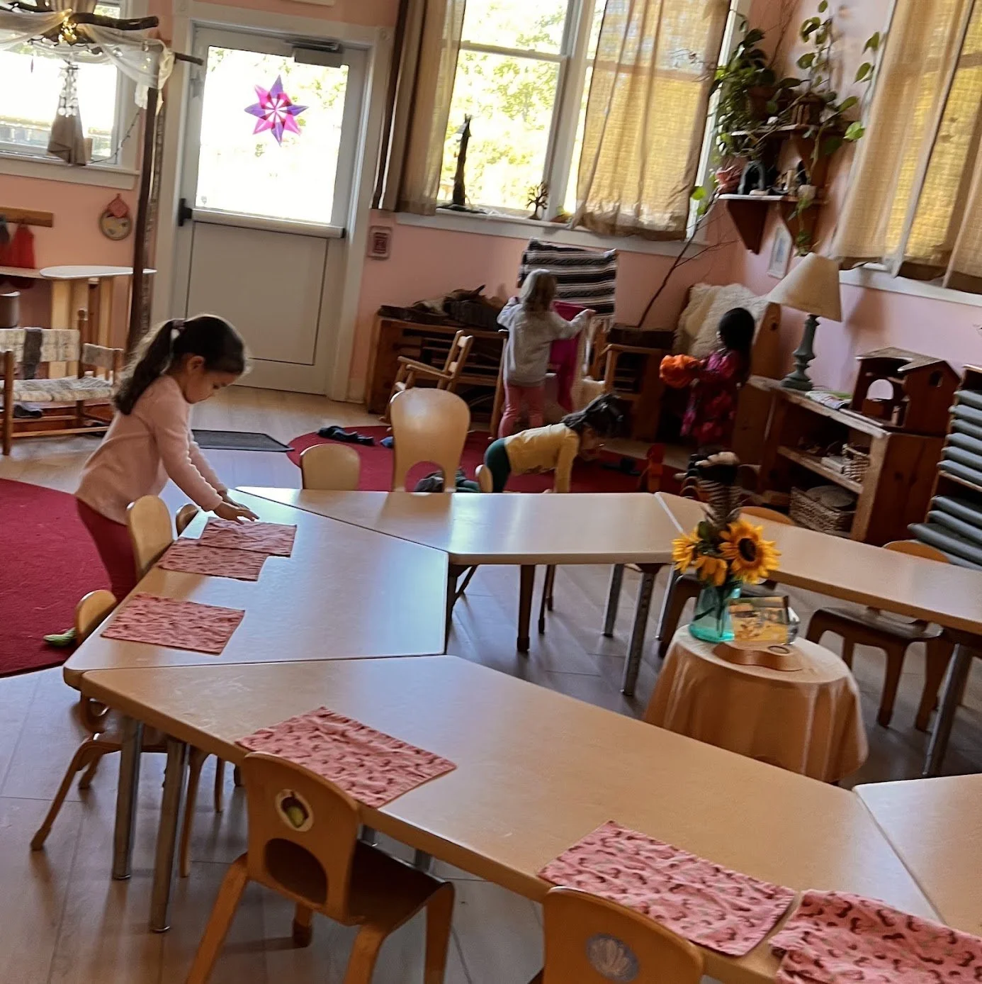 Setting the table gives children a chance to care for others and take pride in their growing independence.