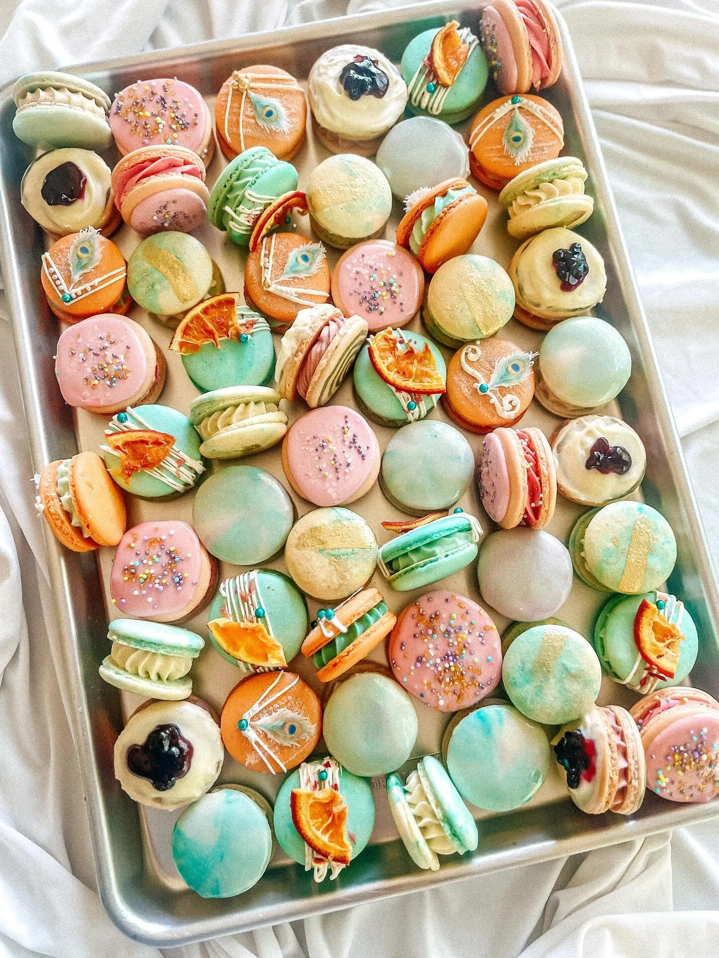 TWO DAYS until you can pick up your TS12-inspired macaron boxes!!! (3 days until they&rsquo;ll be delivered, if you paid for that option.)

Here&rsquo;s a flavor guide, from top to bottom, based on the second photo:

1. Opalite: Vanilla macaron with 