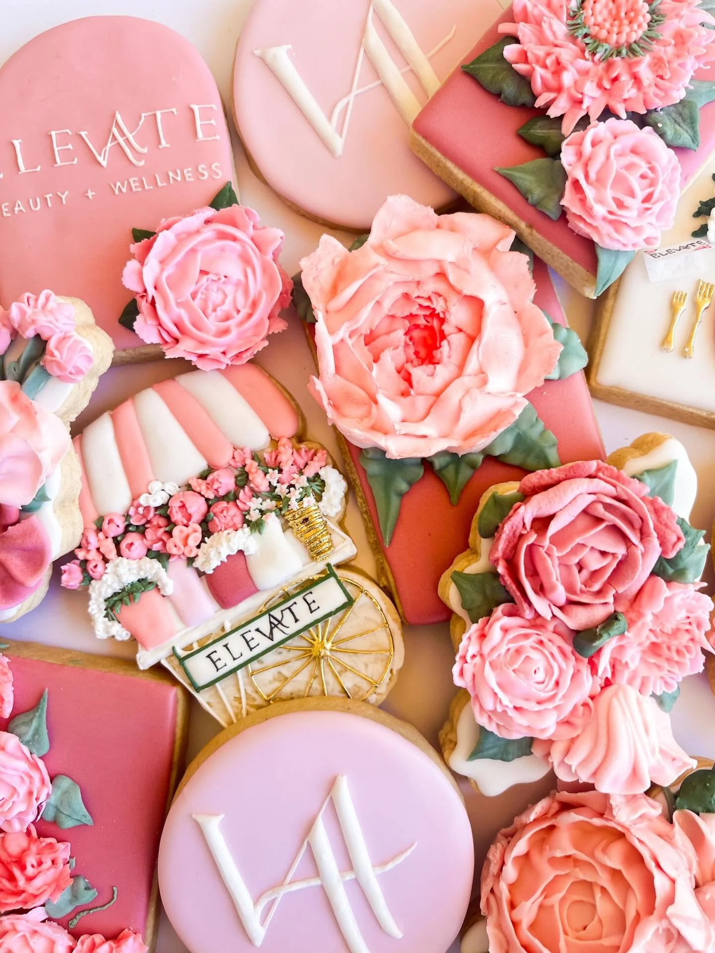 There&rsquo;s a fairly decent chance you&rsquo;re going to get sick of seeing pics from this cookie/floral cupcake/macaron order for the Elevate Beauty + Wellness soft grand opening, but idk what to tell you. 

Floral orders when it&rsquo;s almost Sp