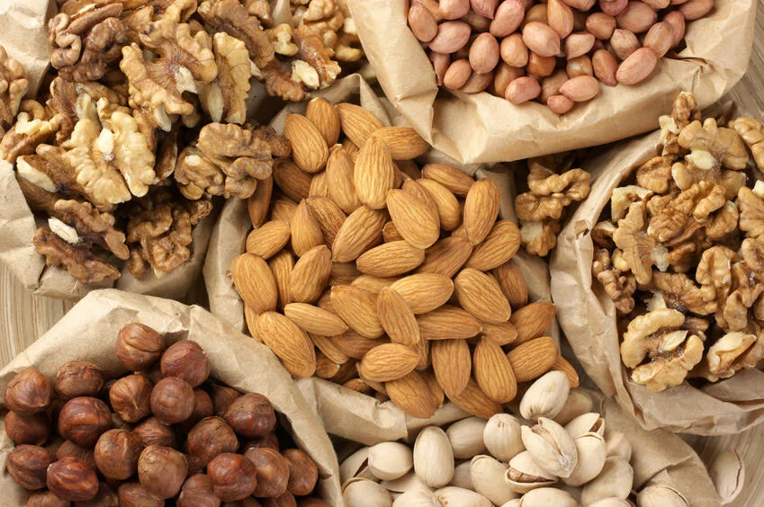 Bulk nuts including almonds pistachios cashews and walnuts sourced by Cardassilaris Family