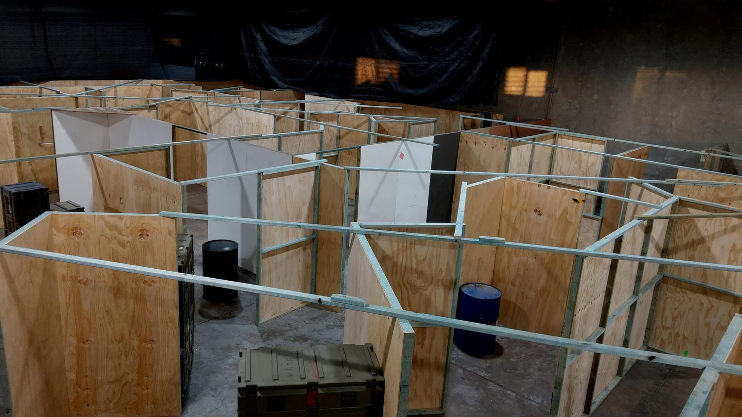 The indoor CQB maze at Urban Gel Ball, a plywood-walled close-quarters arena at Forest Glen Queensland