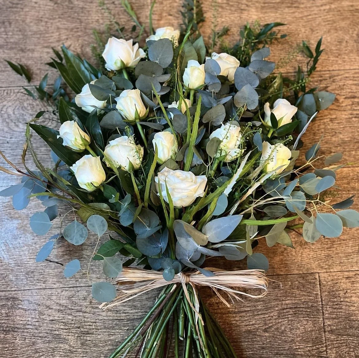 White rose tied sheaf