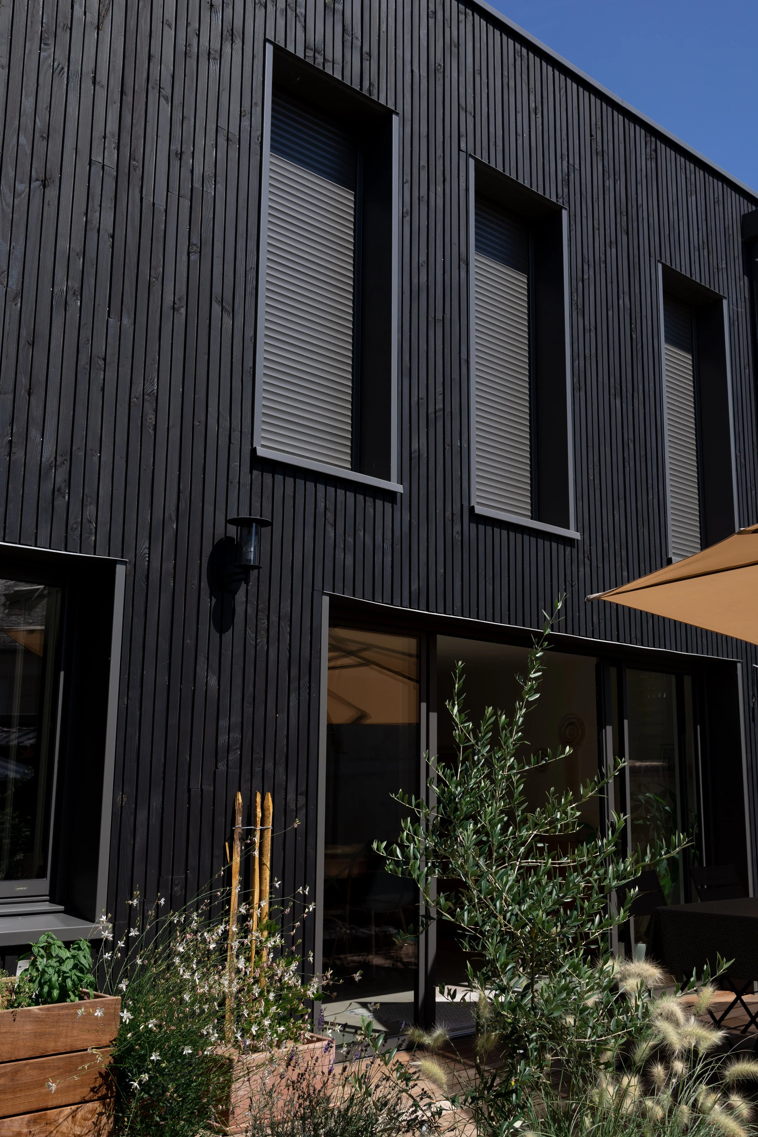 Faç Arrière bois noir_Bd-lauriol_©tipi-architects_21.jpg