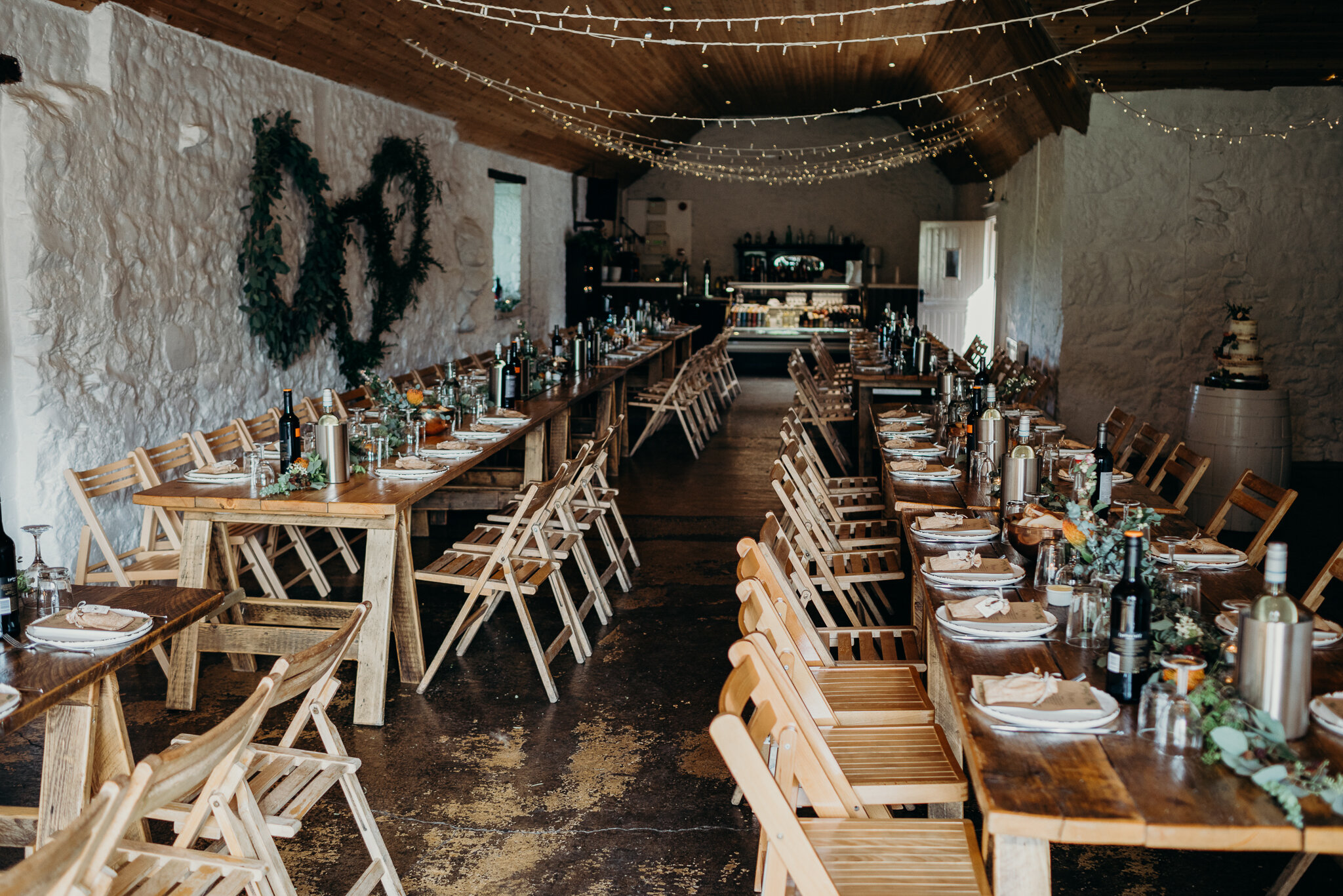 interior view of dalduff farm decorated for wedding reception with sparrow &amp; rose flowers photographed by wedding photographer ayrshire scotland
