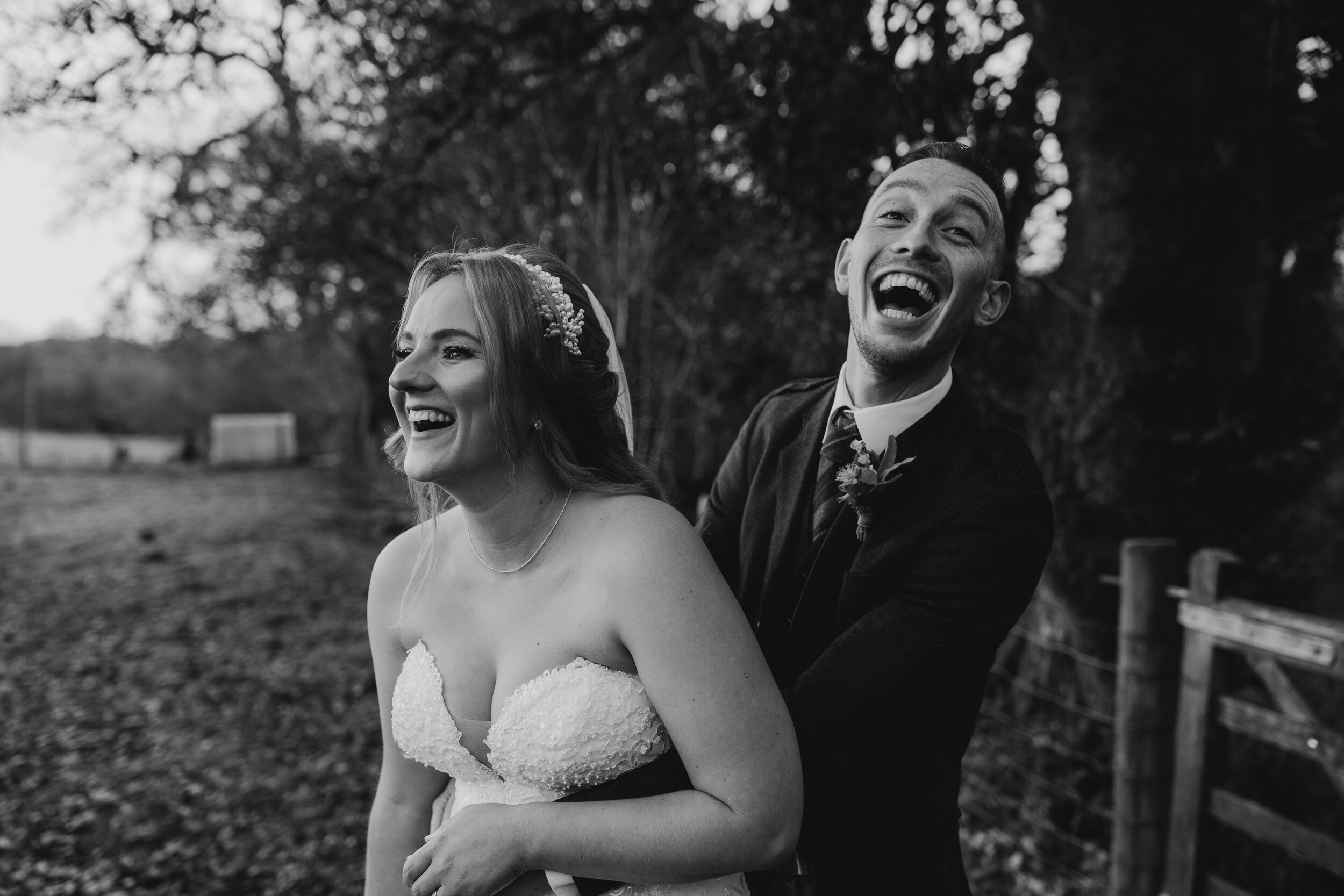 fruin farm micro wedding loch lomond scotland bride groom laughing hugging