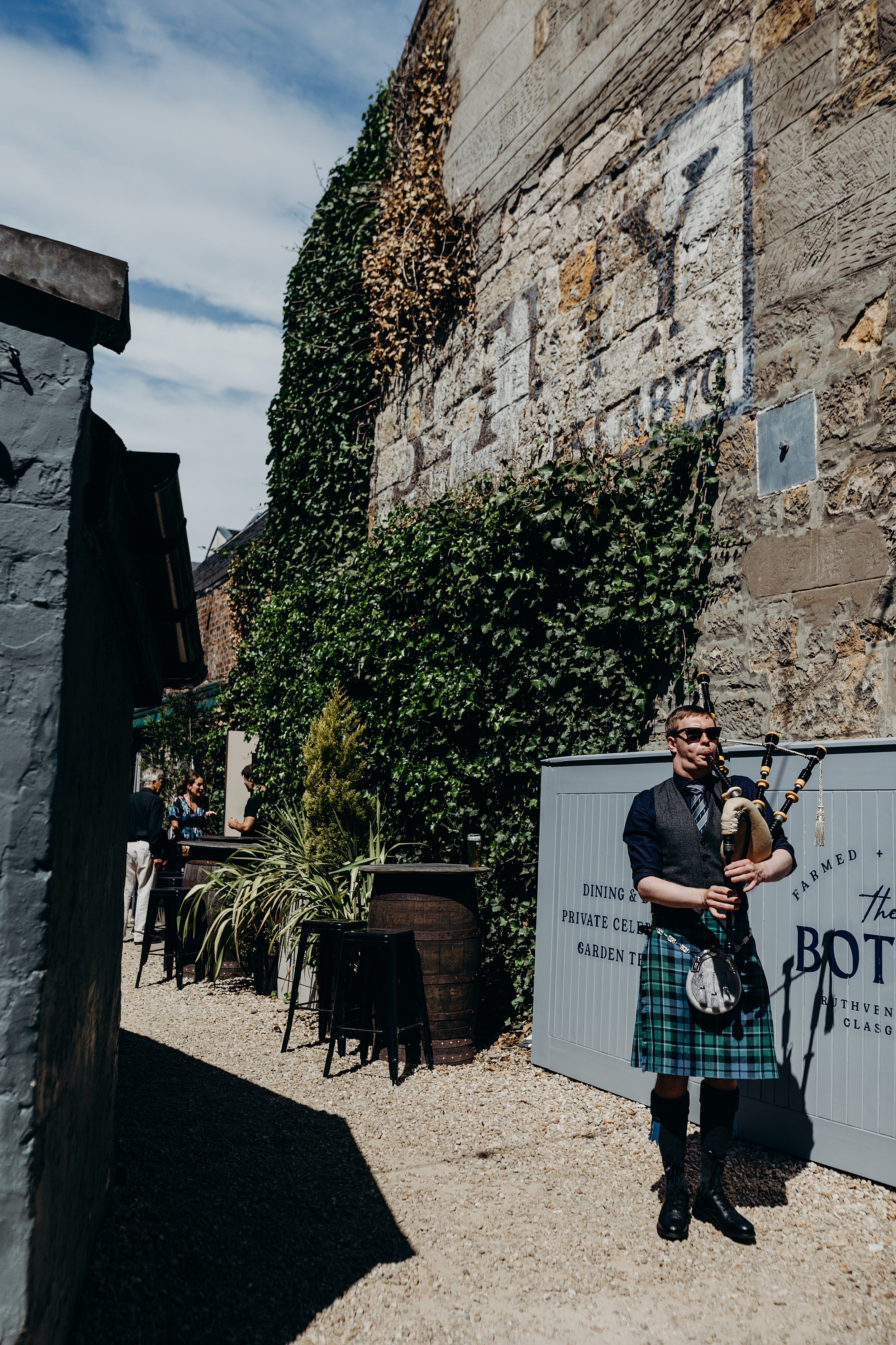 piper outside the bothy glasgow wedding for a mini wedding in glasgow west end