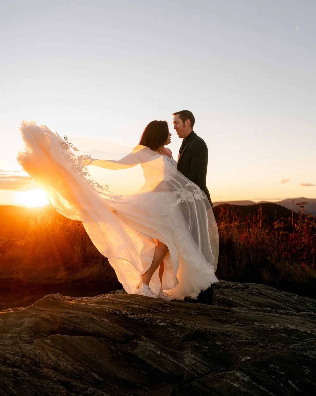 Chilly air, golden light, and a love that deserved to be celebrated all over again. This sweet couple treated themselves to an anniversary trip and an anniversary session in the NC mountains along the Blue Ridge Parkway&mdash;and wow, did the sunset 