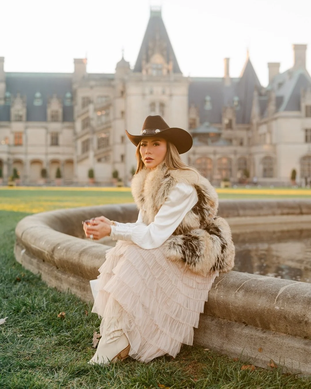 Texan chic meets Biltmore fall vibes! Cowboy hat, boots, and autumn leaves turned this solo travel portrait into a full-on fashion shoot. 

#AshevillePhotographer #AshevilleFashionPhotography #TravelPortraits #TexanStyle #CowboyBoots #CowboyHat #Bilt