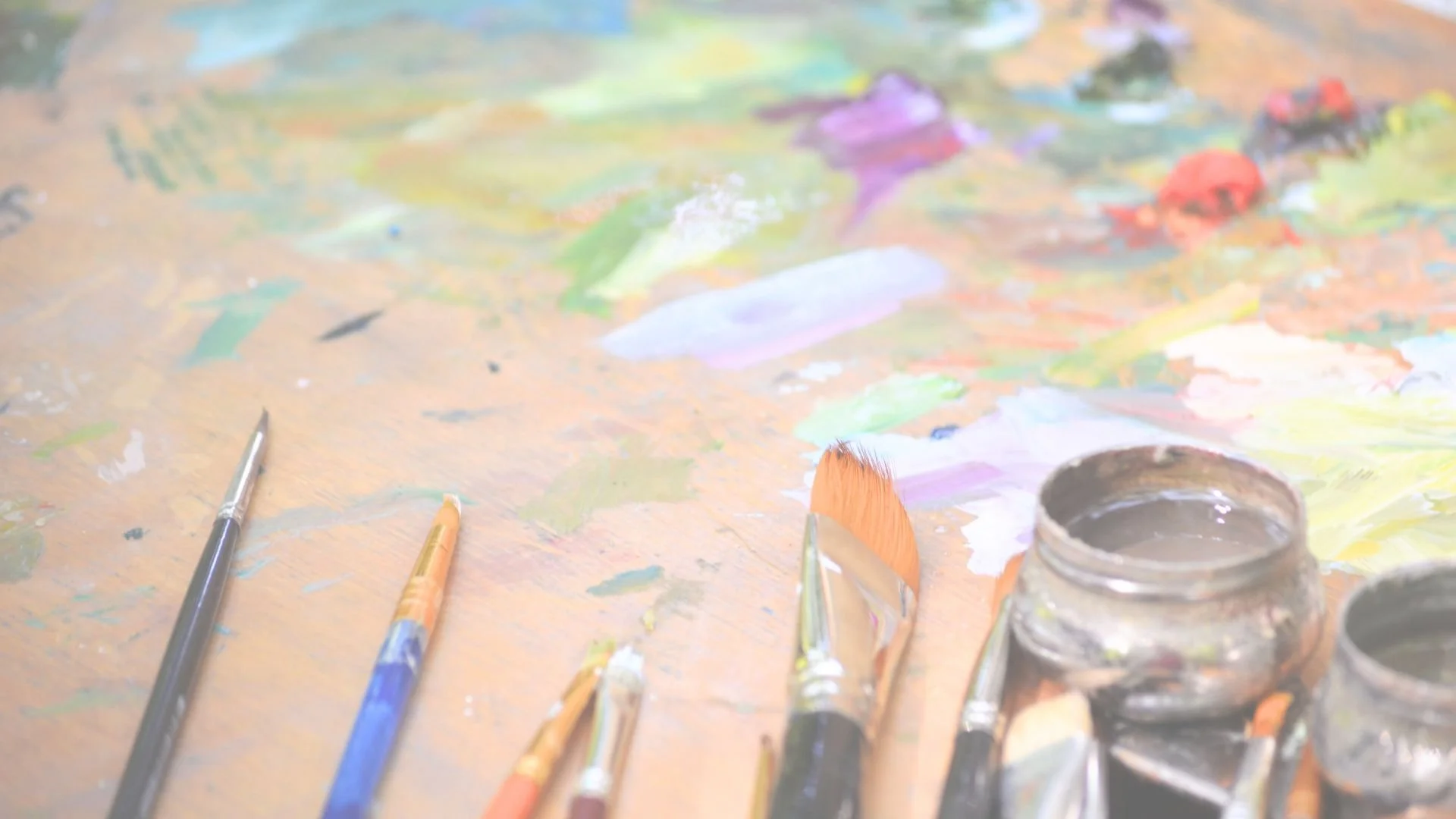 Abstract artwork with a textured white circular form at the center against a blue background, radiating white lines extending outward.