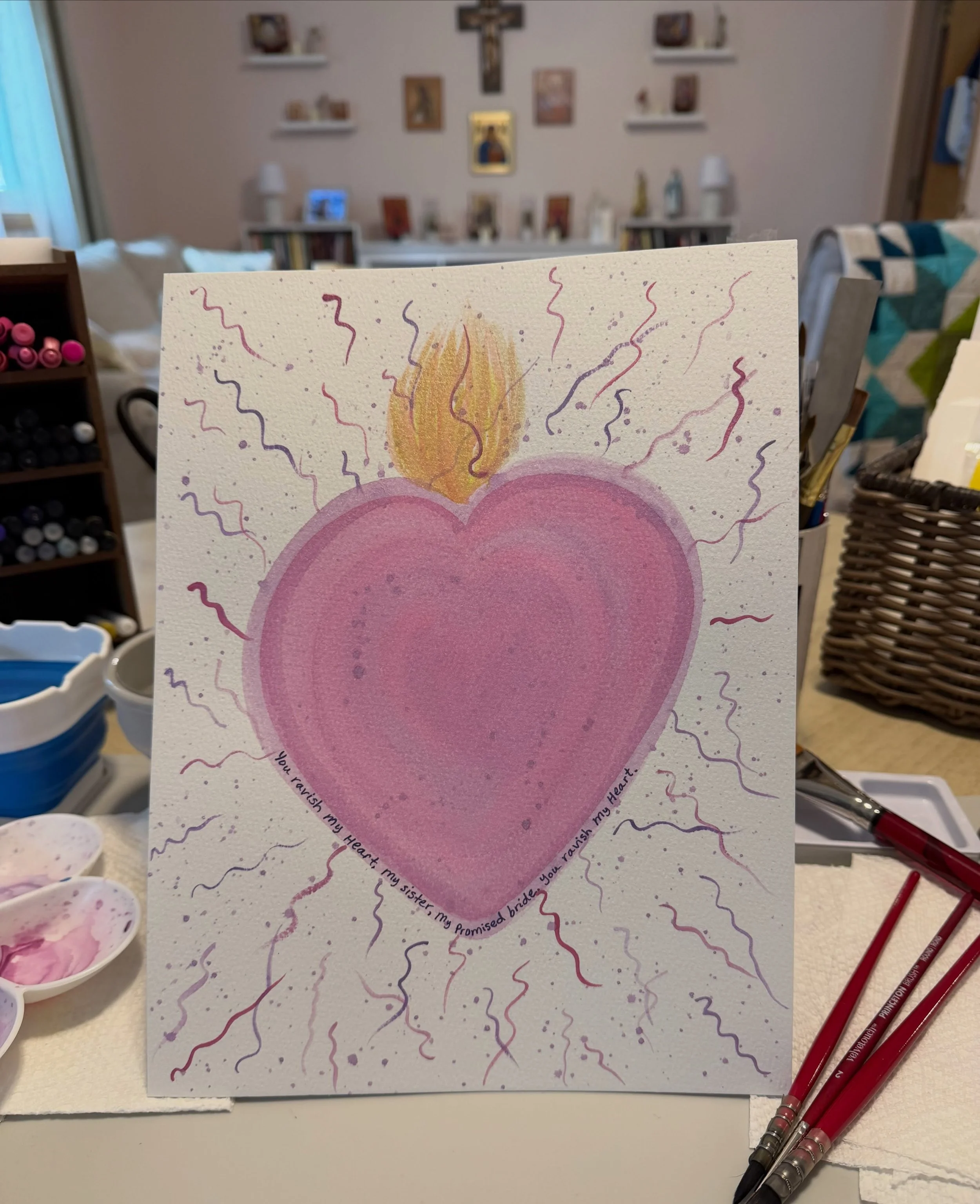 In the Song of Songs, the Bridegroom tells the Bride that she ravishes his heart. I was contemplating that line last night as I did my watercolor prayer art. I tried to imagine what Jesus&rsquo; Heart might look like as He is ravished by the beauty o