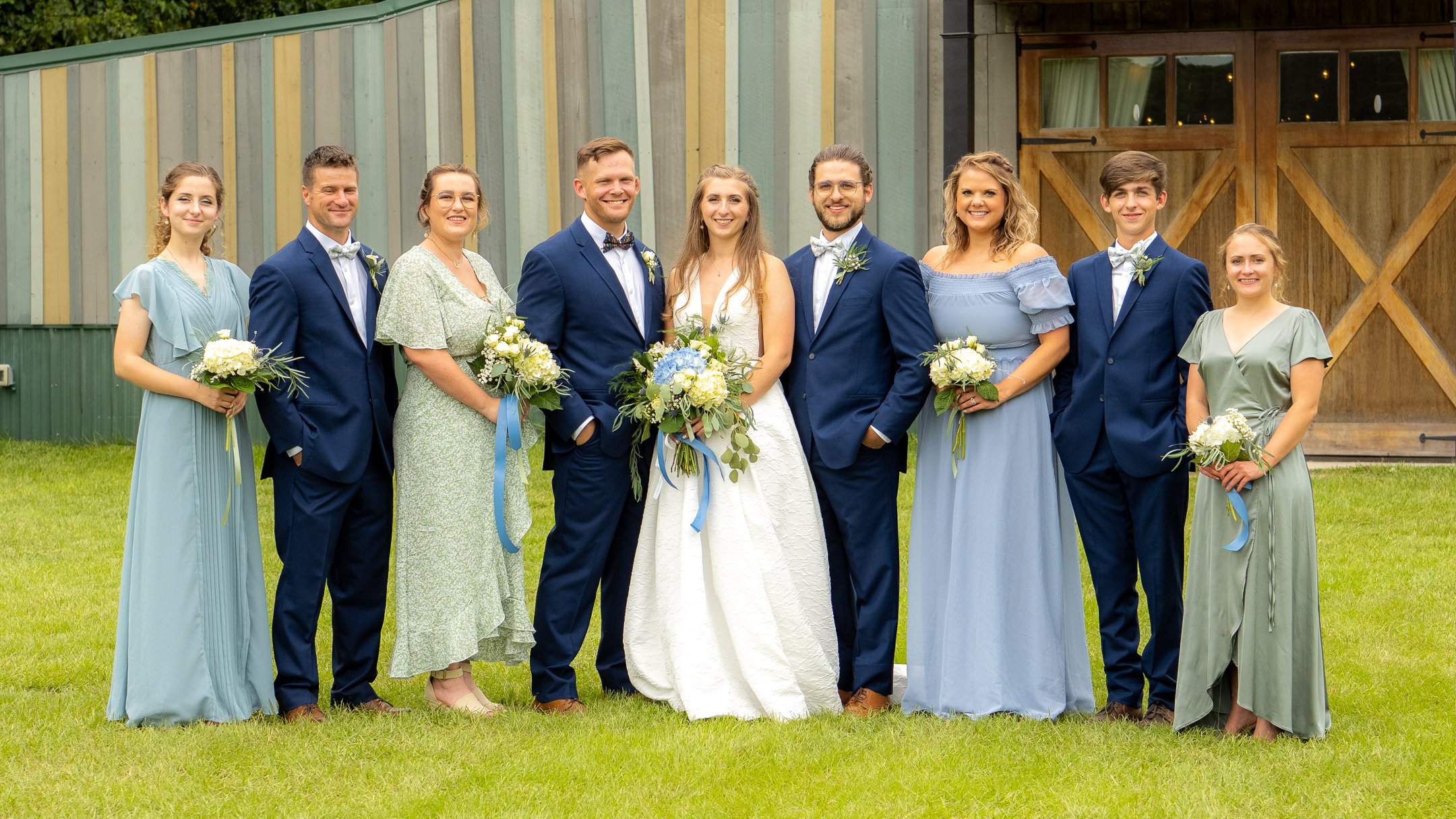 Bridal-Party-Colors-Match-Stripes-On-Barn.jpeg