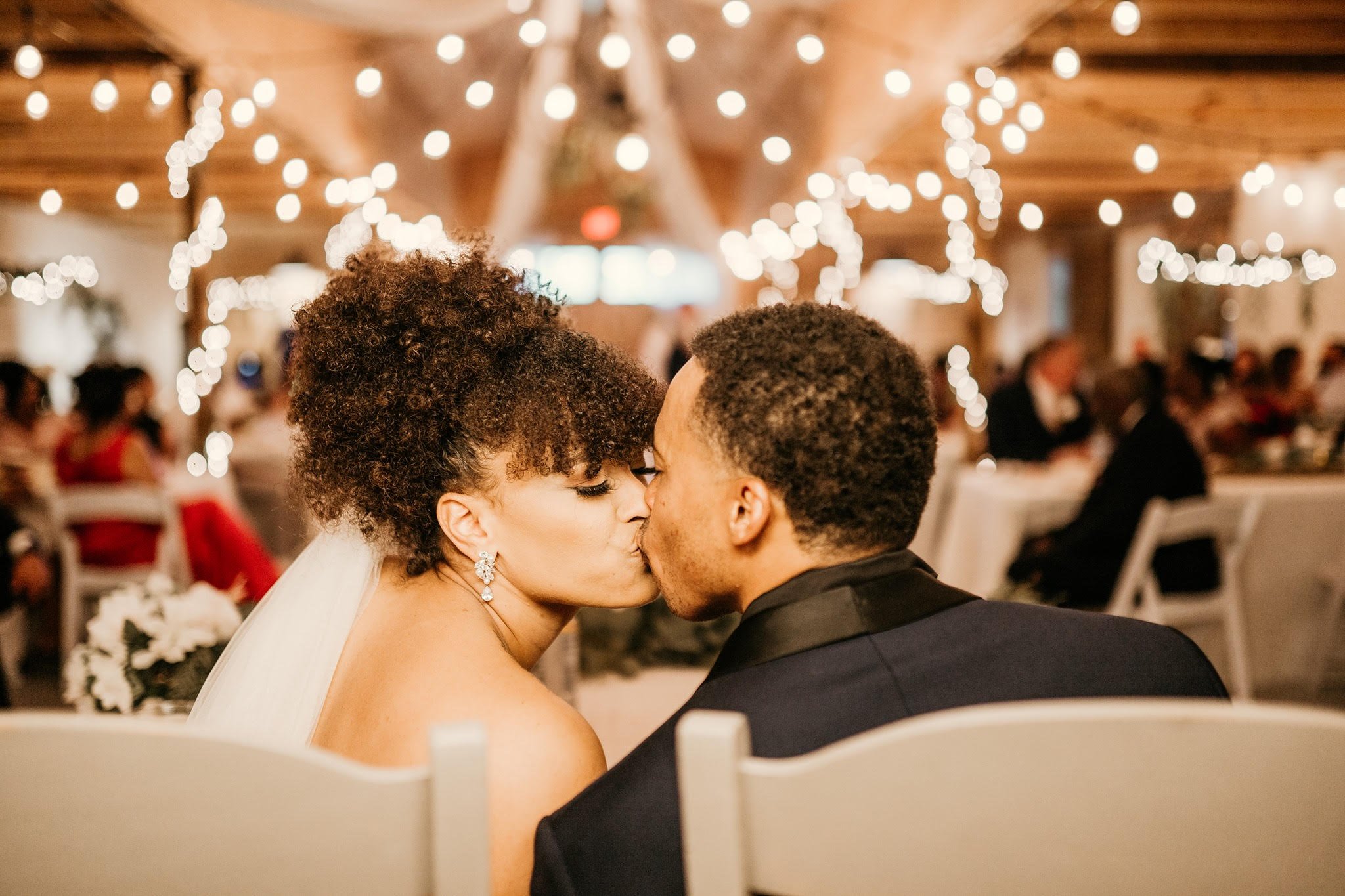 Wedding-Couple-Sweetheart-Kiss-Shimmering-Lights.jpg